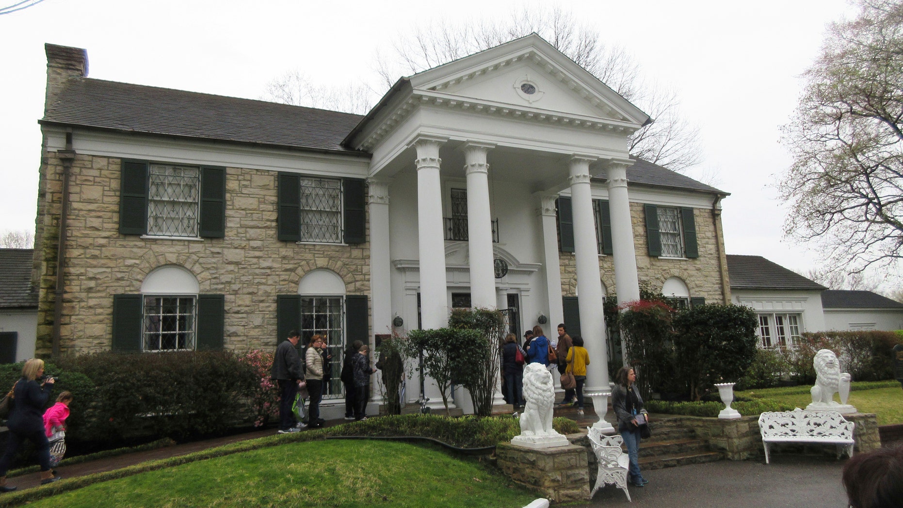 This March 13, 2017, photo shows visitors getting ready to tour Graceland in Memphis, Tenn. (Associated Press)
