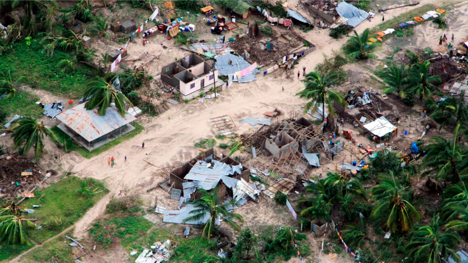 In this photo provided by the United Nations Office for the Coordination of Humanitarian Affairs (OCHA), badly damaged communities are seen from an aerial view, Ibo island, Mozambique, on Saturday, April 27, 2019. Authorities have urged many residents to seek higher ground in the wake of Cyclone Kenneth as rain lashes the region. (Saviano Abreu/OCHA via AP)