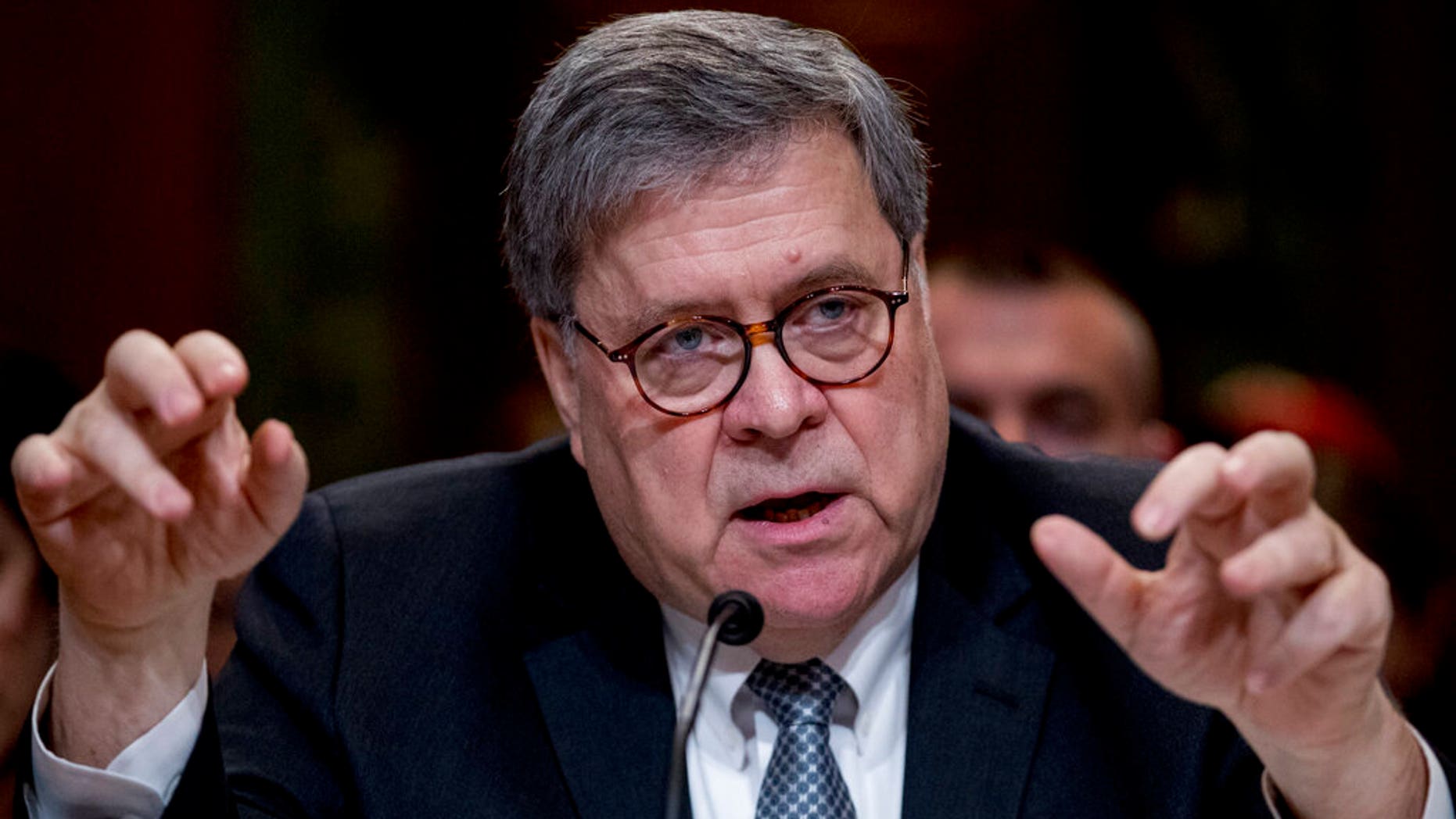 Attorney General William Barr reacts as he appears before a Senate Appropriations subcommittee to make his Justice Department budget request, Wednesday, April 10, 2019, in Washington. Barr said Wednesday that he was reviewing the origins of the Trump-Russia investigation. He said he believed the president's campaign had been spied on and he was concerned about possible abuses of government power. (AP Photo/Andrew Harnik)