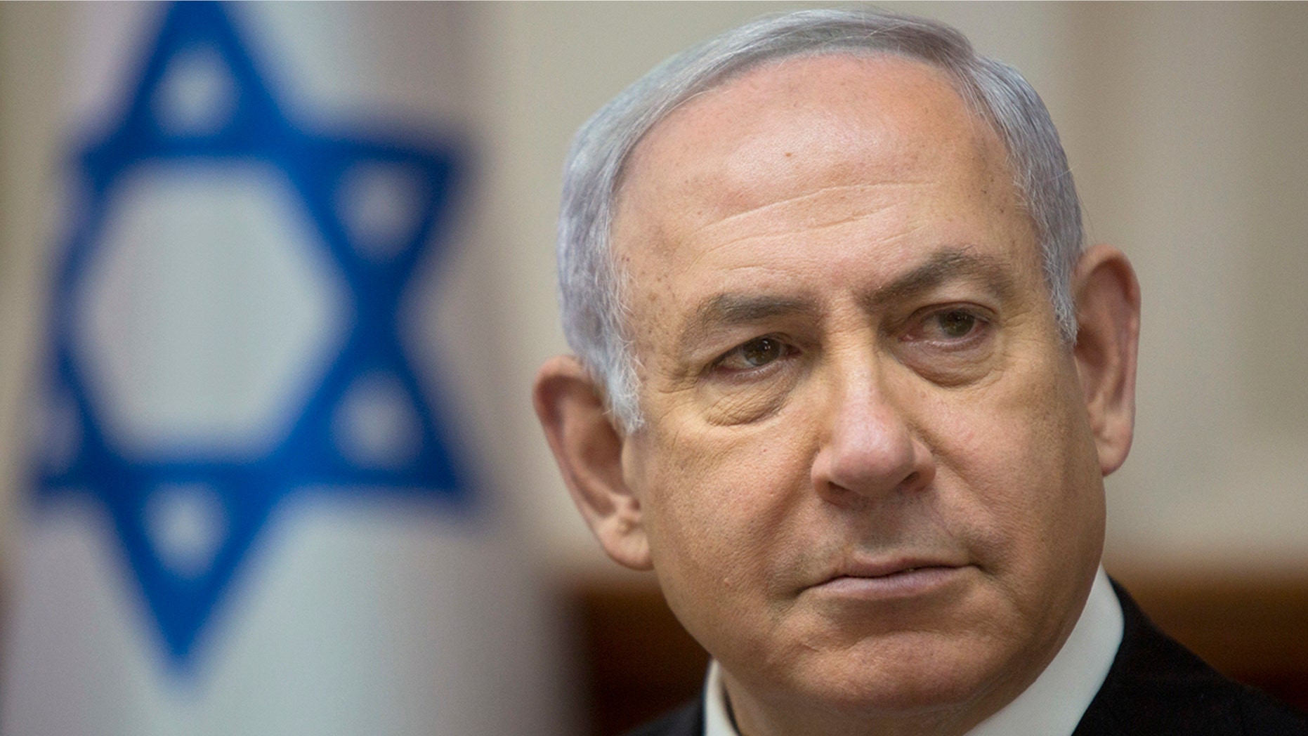 Israeli Prime Minister Benjamin Netanyahu arrives for a weekly cabinet meeting at the Prime Minister's office in Jerusalem, Sunday, April 29, 2018. (AP Photo/Sebastian Scheiner)