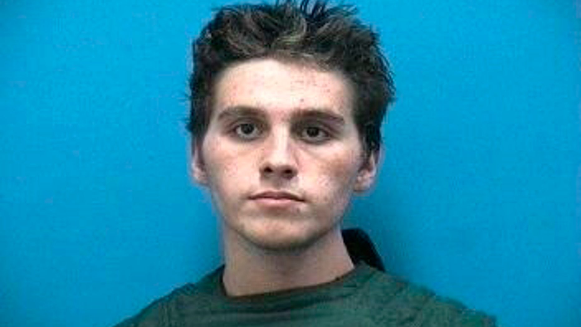 FILE - This Oct. 3, 2016, file photo, provided by the Martin County Sheriff's Office, shows Austin Harrouff. A judge will allow as evidence a video of Harrouff struggling against his restraints at a Florida hospital on the night he's accused of killing two people. Harrouff's attorneys say the video shows the "mental status" of the 22-year-old hours after he's accused of killing 59-year-old John Stevens III and 53-year-old Michelle Mishcon. (Martin County Sheriff's Office via AP, File)