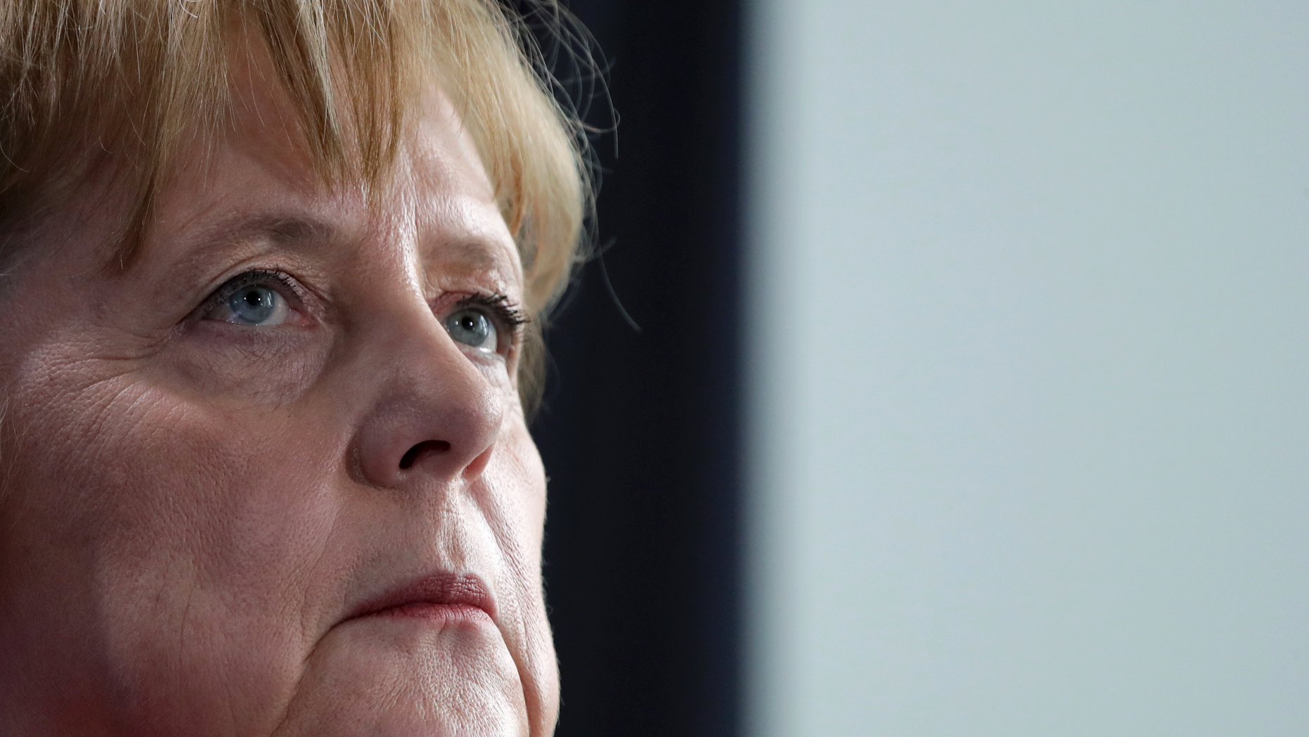 German Chancellor Angela Merkel looks up during joint press conference with the President of Ukraine, Petro Poroshenko, as part of a meeting at the chancellery in Berlin, Germany, Friday, April 12, 2019. (AP Photo/Michael Sohn)