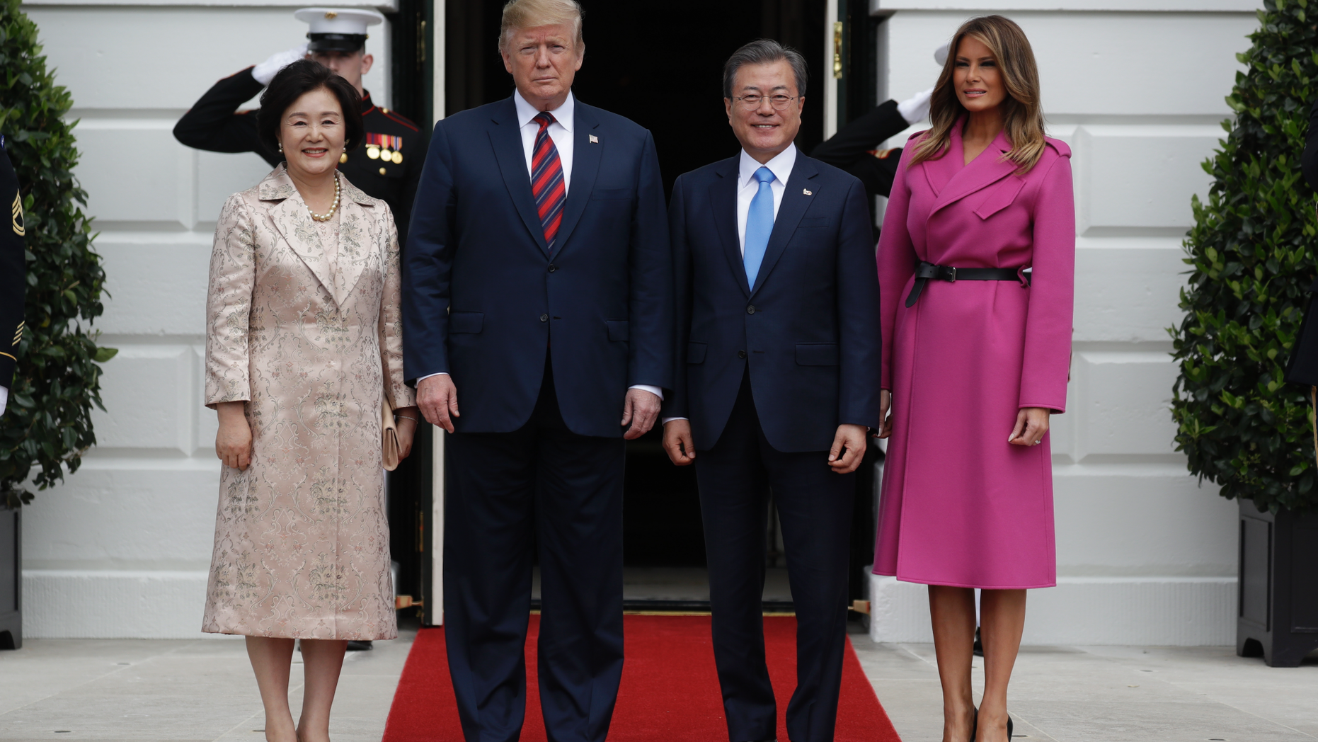 President Donald Trump and first lady Melania Trump greet South Korean President Moon Jae-In and his wife Kim Jung-Sook on the South Lawn of the White House, Thursday, April 11, 2019, in Washington. (AP Photo/Evan Vucci)