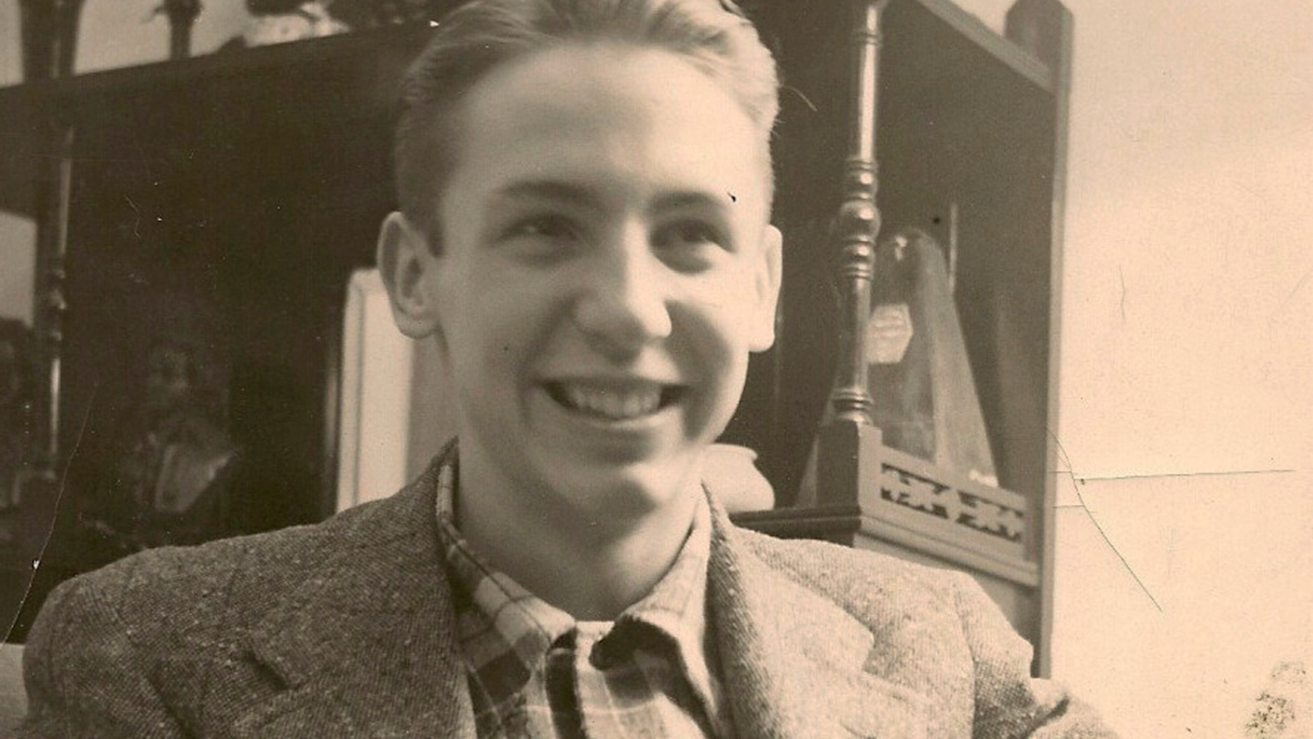 This undated photo provided by the March Field Air Museum in April 2019 shows Army Air Forces Staff Sgt. Vincent J. Rogers Jr. at his home in Snyder, N.Y. U.S. military officials say the remains of the western New York airman killed in a plane crash in the Pacific during World War II have been identified. (March Field Air Museum via the AP)