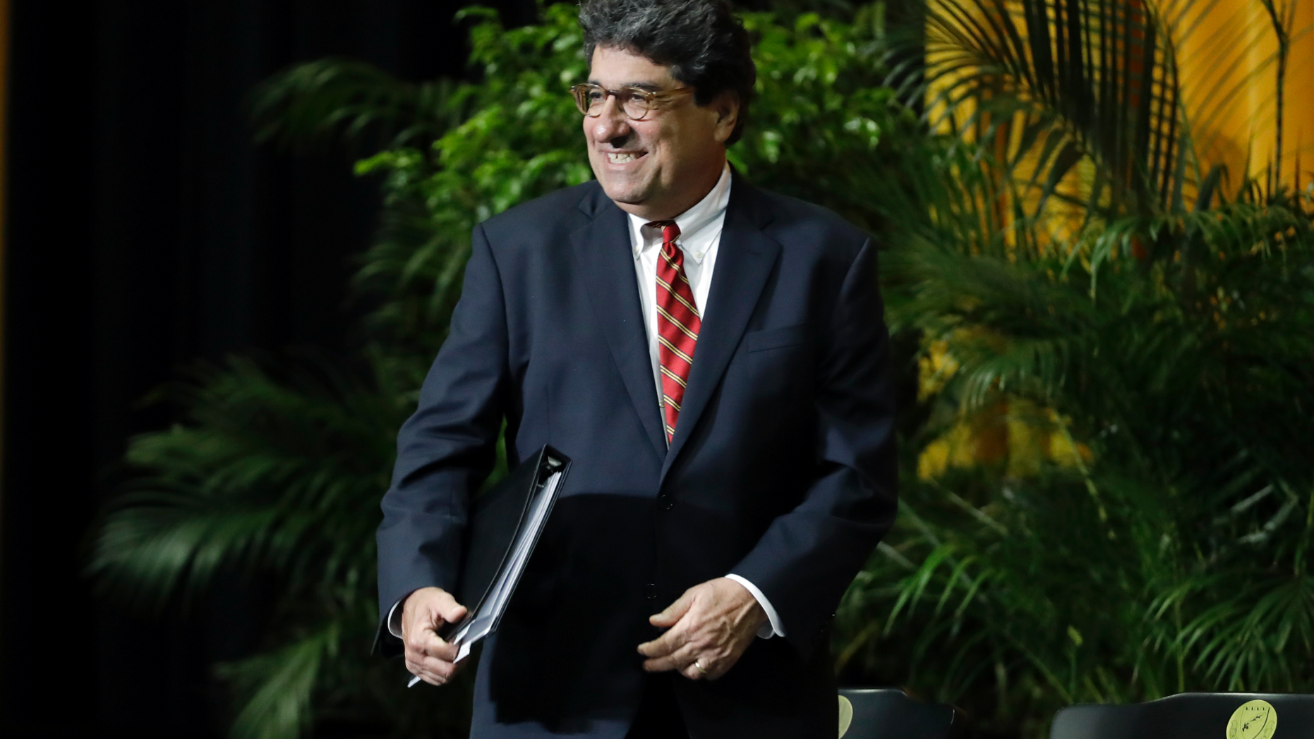 FILE - In this May 10, 2018, file photo, Vanderbilt University Chancellor Nick Zeppos takes part in Senior Day activities in Nashville, Tenn. Citing health reasons, Zeppos has announced plans to resign on Aug. 15, 2019, after more than a decade in the role. Zeppos announced Tuesday, April 2 that he plans to take a yearlong sabbatical before he returns to Vanderbilt as a law professor. (AP Photo/Mark Humphrey, File)