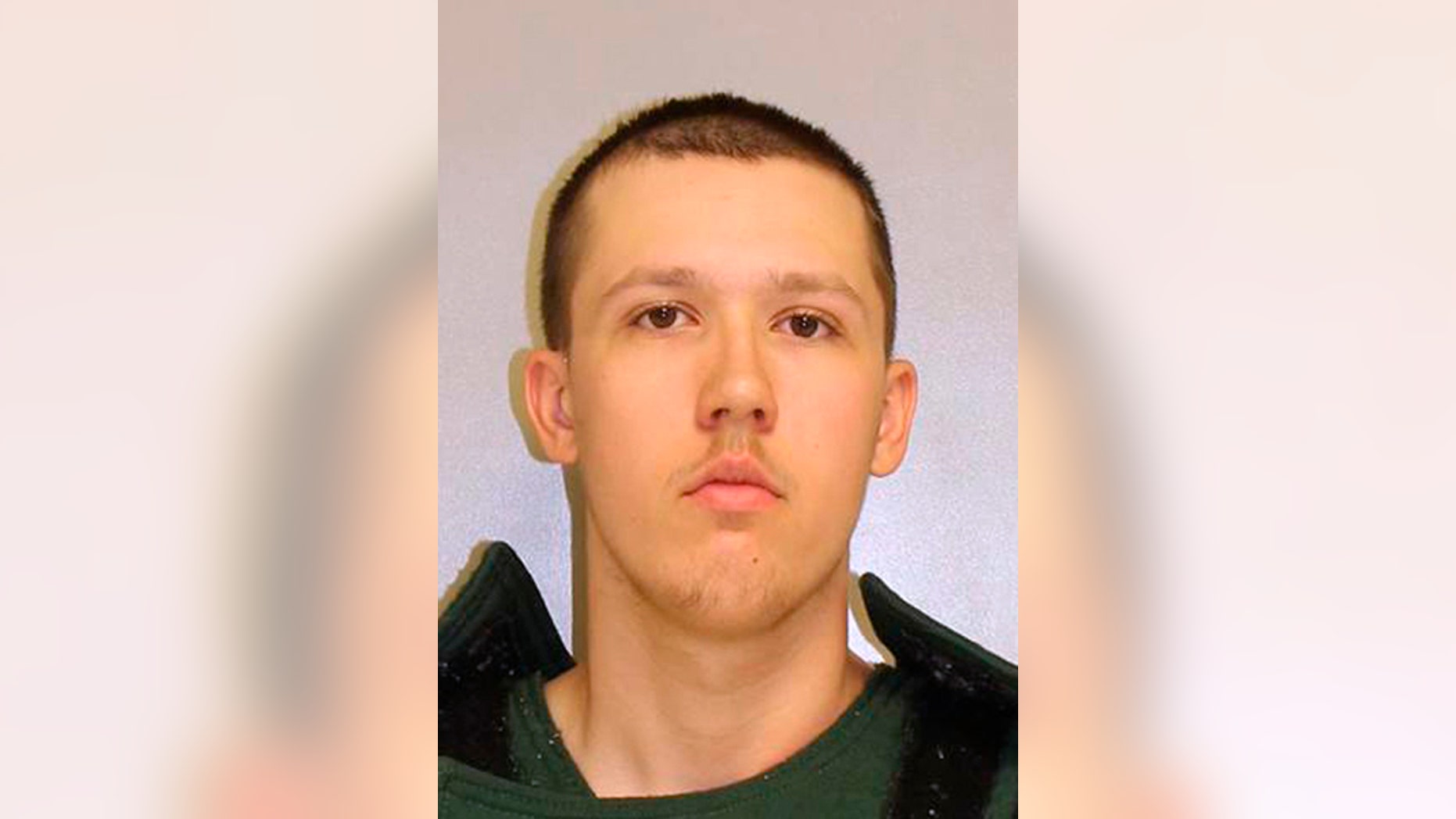 Thomas Dewald is shown in an undated photo provided by the Franklin County, Pa., Jail. Police say Dewald, a 20-year-old Pennsylvania man, entered a home’s unlocked front door, snatched a four-year-old girl from her bed, took her his grandparents’ house, bound her and locked her in a wooden trunk. Pennsylvania State Police say Thomas Dewald faces multiple charges including kidnapping, unlawful restraint and indecent assault. (Franklin County Jail via AP)