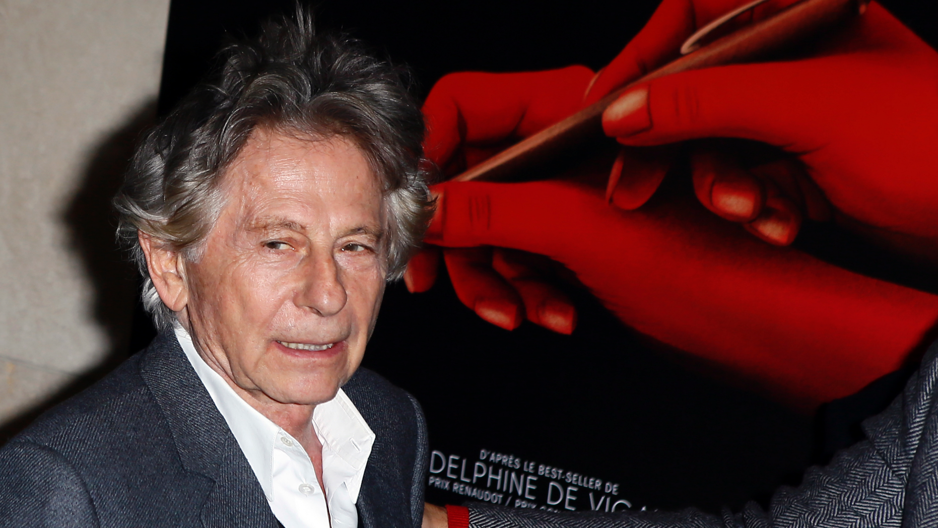 FILE - In this Oct. 30, 3017 file photo director Roman Polanski poses a photo prior to the screening of "Based on a true story" in Paris, France. Roman Polanski is asking a judge to restore his membership in the Academy of Motion Picture Arts and Sciences after he was expelled for misconduct last year. Lawyers for the 85-year-old director filed documents Friday, April 19, 2019 requesting that a court compel the academy to make him a member in good standing again. (AP Photo/Francois Mori, File)