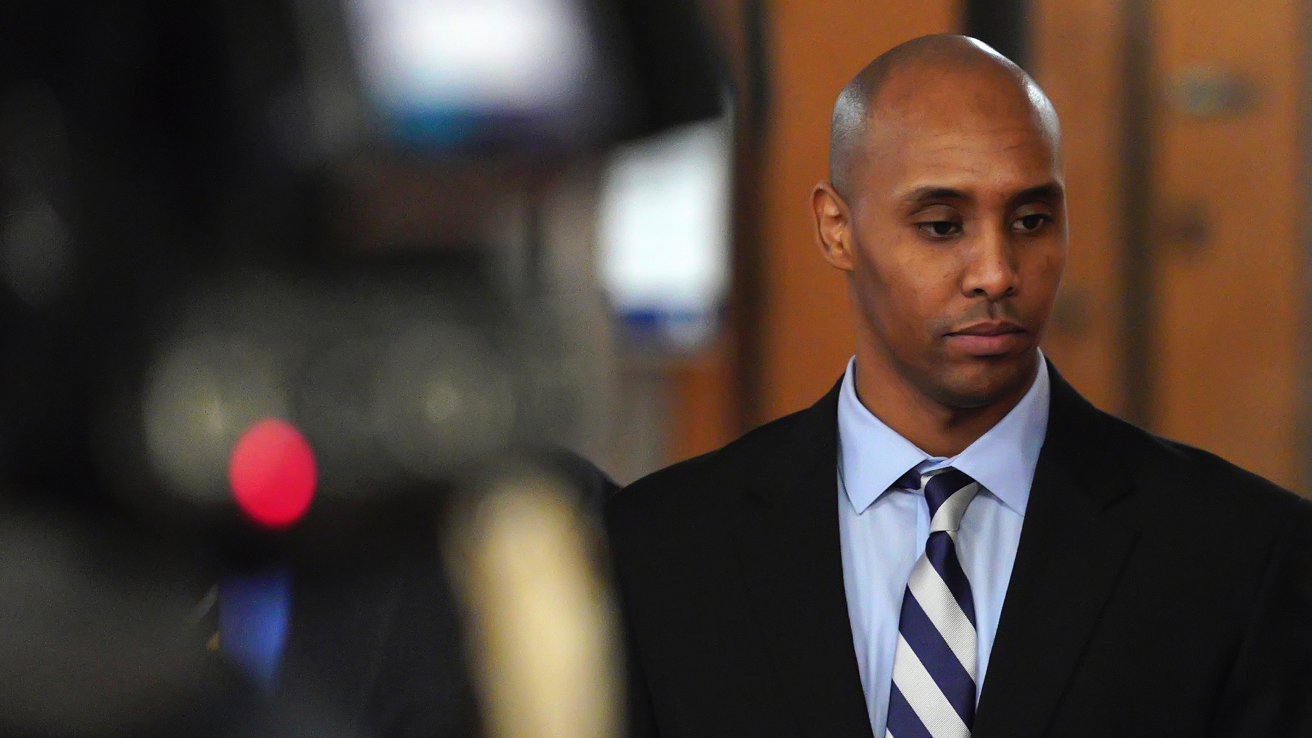 Former Minneapolis police officer Mohamed Noor walks out of the the Hennepin County Government Center Thursday, April 25, 2019, in Minneapolis. Noor took the witness stand in his murder trial for the fatal shooting of Justine Ruszczyk Damond Thursday afternoon, breaking an almost two year public silence to testify about his upbringing and police training. (Brian Peterson/Star Tribune via AP)