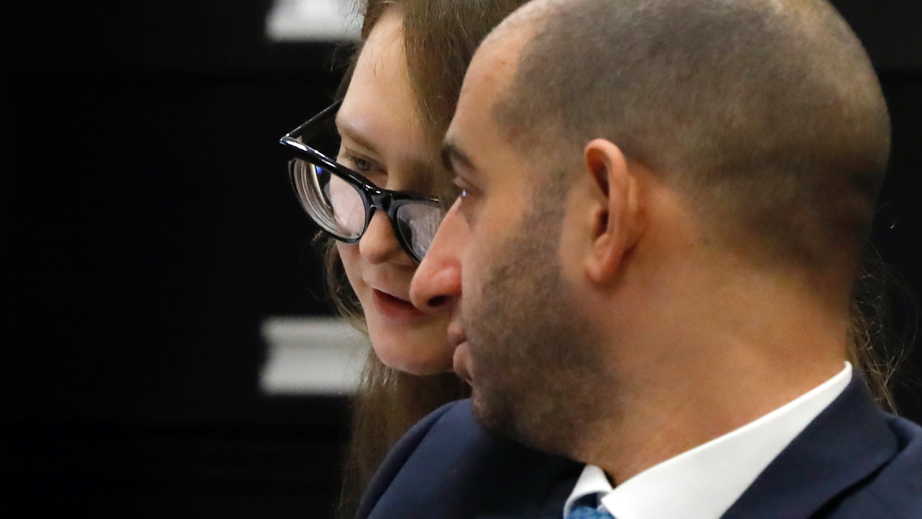 Anna Sorokin, and her attorney Todd Spodek, confer during her trial at New York State Supreme Court, in New York, Monday, April 22, 2019. Sorokin, who claimed to be a German heiress, is on trial on grand larceny and theft of services charges. (AP Photo/Richard Drew)