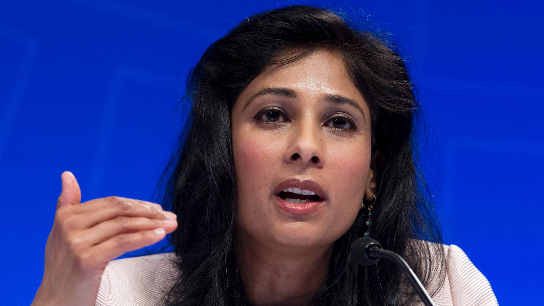 Chief Economist and Director of Research Department at the IMF, Gita Gopinath, speaks during a news conference at the World Bank/IMF Spring Meetings, in Washington, Tuesday, April 9, 2019. (AP Photo/Jose Luis Magana)