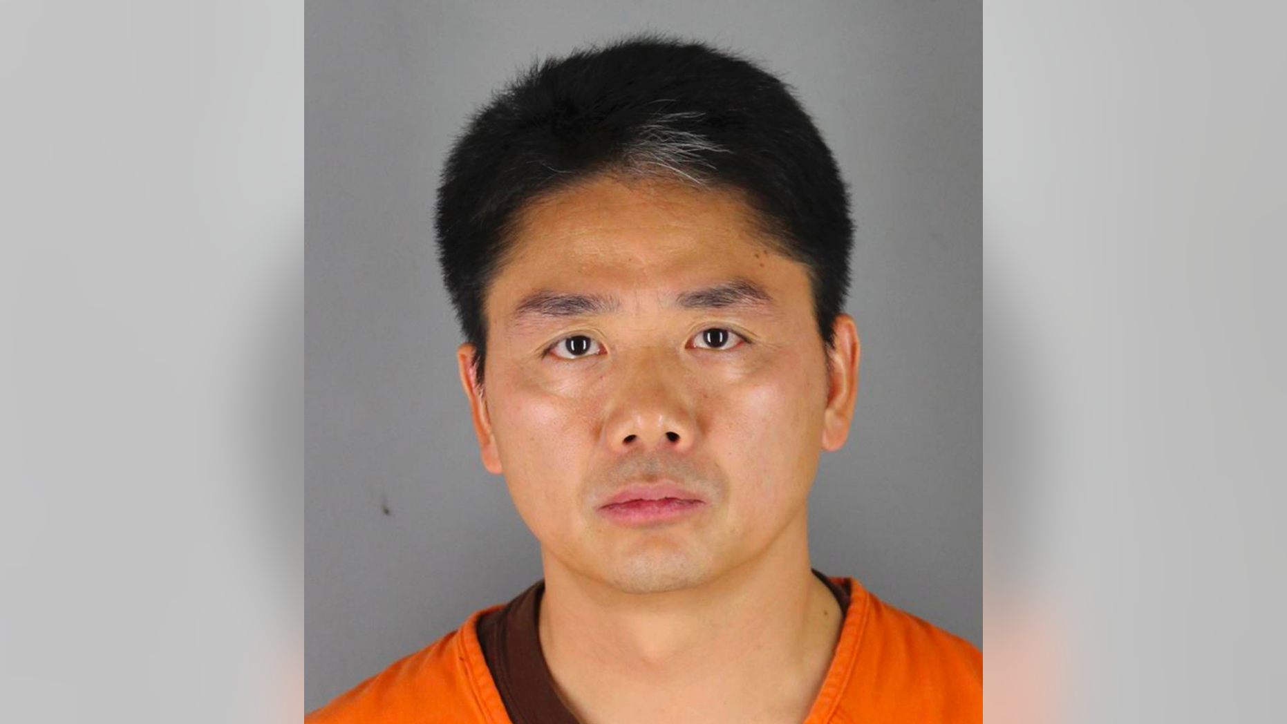 FILE - This 2018 file photo provided by the Hennepin County Sheriff's Office in Minneapolis shows Chinese billionaire Liu Qiangdong, also known as Richard Liu, the founder of the Beijing-based e-commerce site JD.com, who was arrested Aug. 31, 2018, in Minneapolis on suspicion of criminal sexual conduct. A woman who said she was raped by Liu filed a lawsuit Tuesday, April 16, 2019, against the billionaire and his company alleging he and other wealthy Chinese executives coerced her to drink during a dinner in the hours before she was attacked. (Hennepin County Sheriff's Office via AP, File)