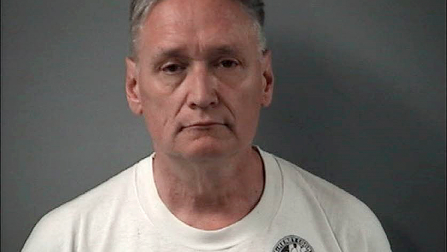 In this April 24, 2019 is a booking photo provided by the Crystal Lake Police Department of Andrew Freund Sr, who along with his wife Joann Cunningham, have been charged with murder and other charges in the death of their missing son Andrew "AJ" Freund. Authorities say they have found what they believe is the body of the 5-year-old boy who went missing last week. Crystal Lake police Chief James Black said at a news conference Wednesday that police dug up what they believe is Freund's body in a field and that it was wrapped in plastic. (Crystal Lake Police Department via AP)