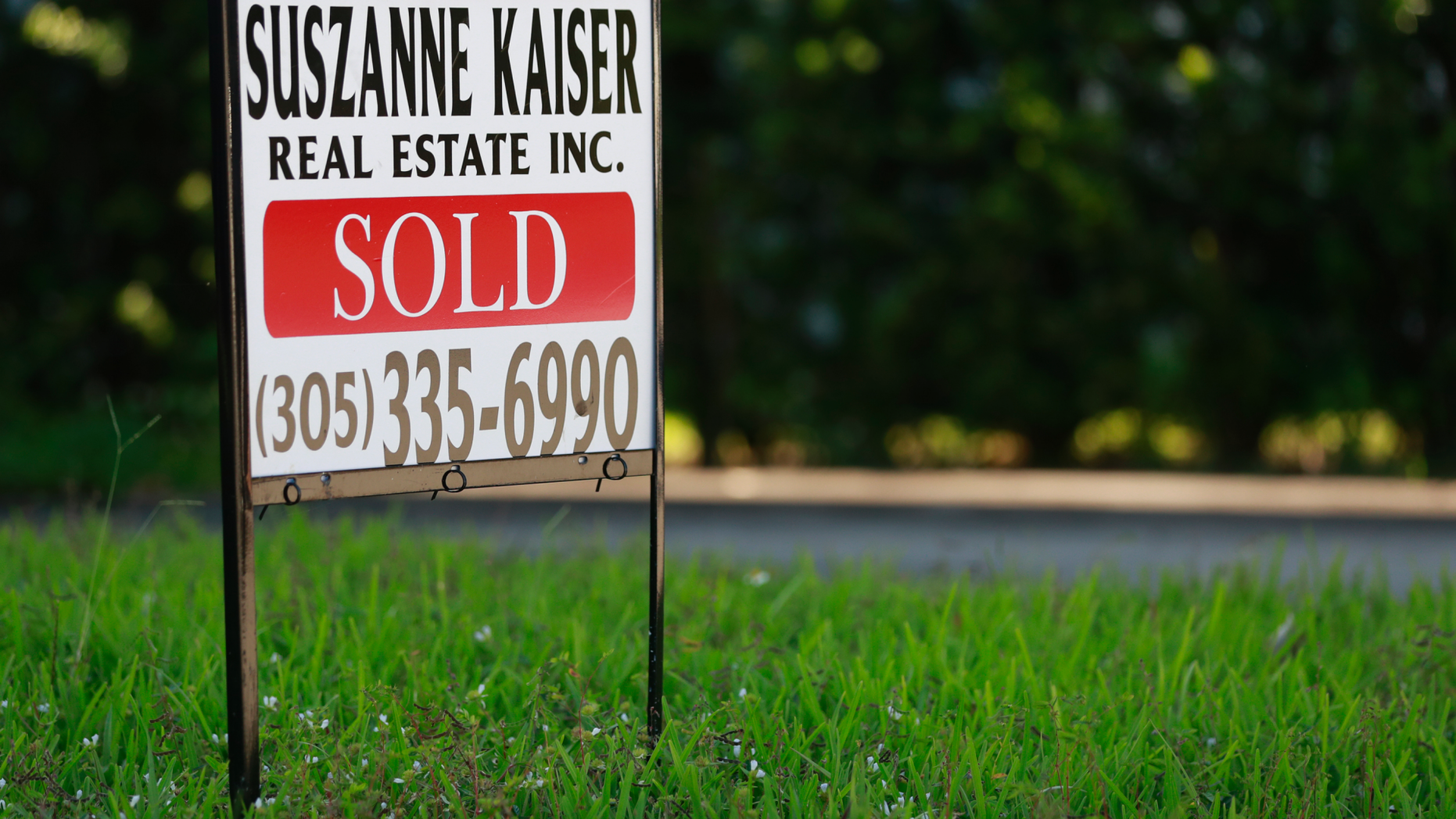 In this Friday, April 12, 2019 photo, a sold sign is shown in front of a home in Surfside, Fla. On Thursday, April 25, Freddie Mac reports on this week’s average U.S. mortgage rates.(AP Photo/Wilfredo Lee)