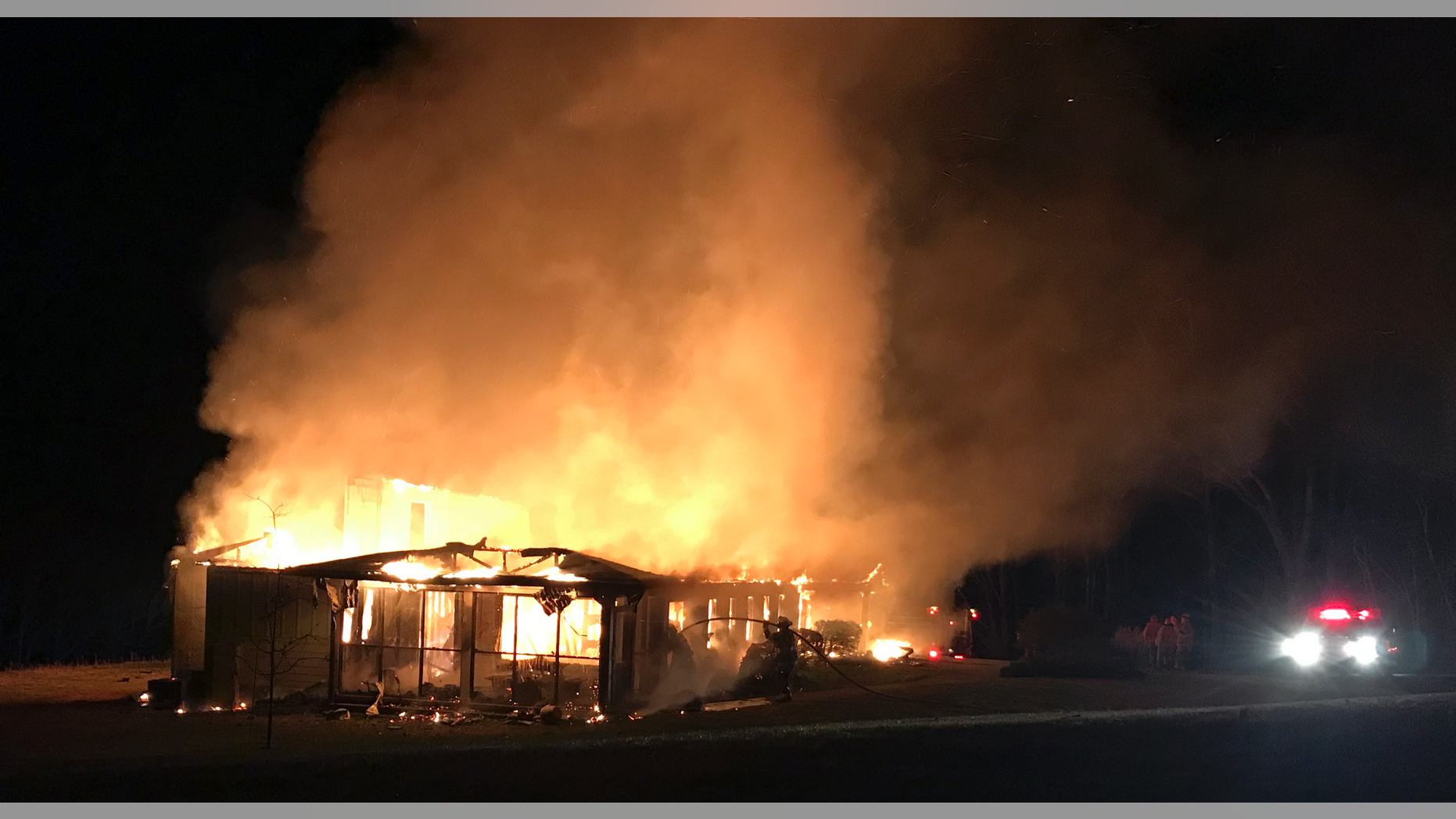 This Friday, March 29, 2019, photo provided by the New Market Fire and Rescue Team shows a fire at the main offices of the Highlander Education and Research Center in New Market, Tenn. The center is a social justice center that trained the Rev. Martin Luther King Jr. and other civil rights leaders. Representatives of the center said Tuesday, April 2, 2019, that a white power symbol was also found spray painted on the parking lot near the building. (Sammy Solomon/New Market Fire and Rescue Team via AP)