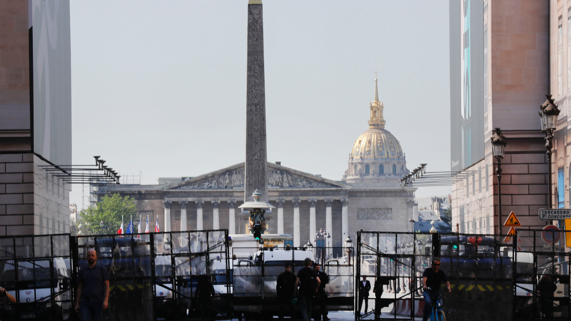 Police seal off an area around the Place de la Concorde prior to a yellow vest demonstration in Paris, Saturday, April 20, 2019. French yellow vest protesters are marching anew to remind the government that rebuilding the fire-ravaged Notre Dame Cathedral isn't the only problem the nation needs to solve. (AP Photo/Michel Euler)