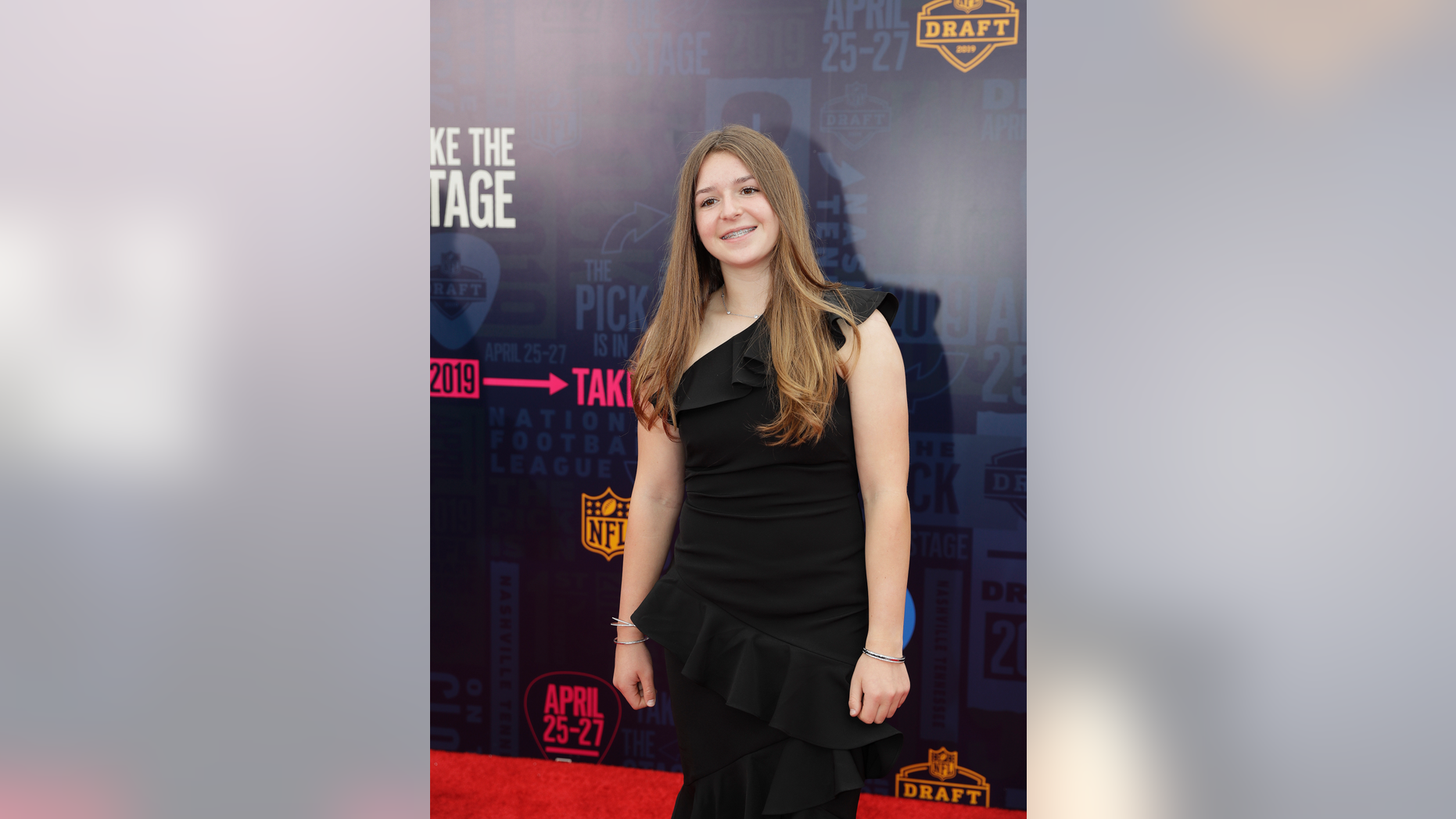 Female football player Sam Gordon walks the red carpet ahead of the first round at the NFL football draft, Thursday, April 25, 2019, in Nashville, Tenn. (AP Photo/Mark Humphrey)