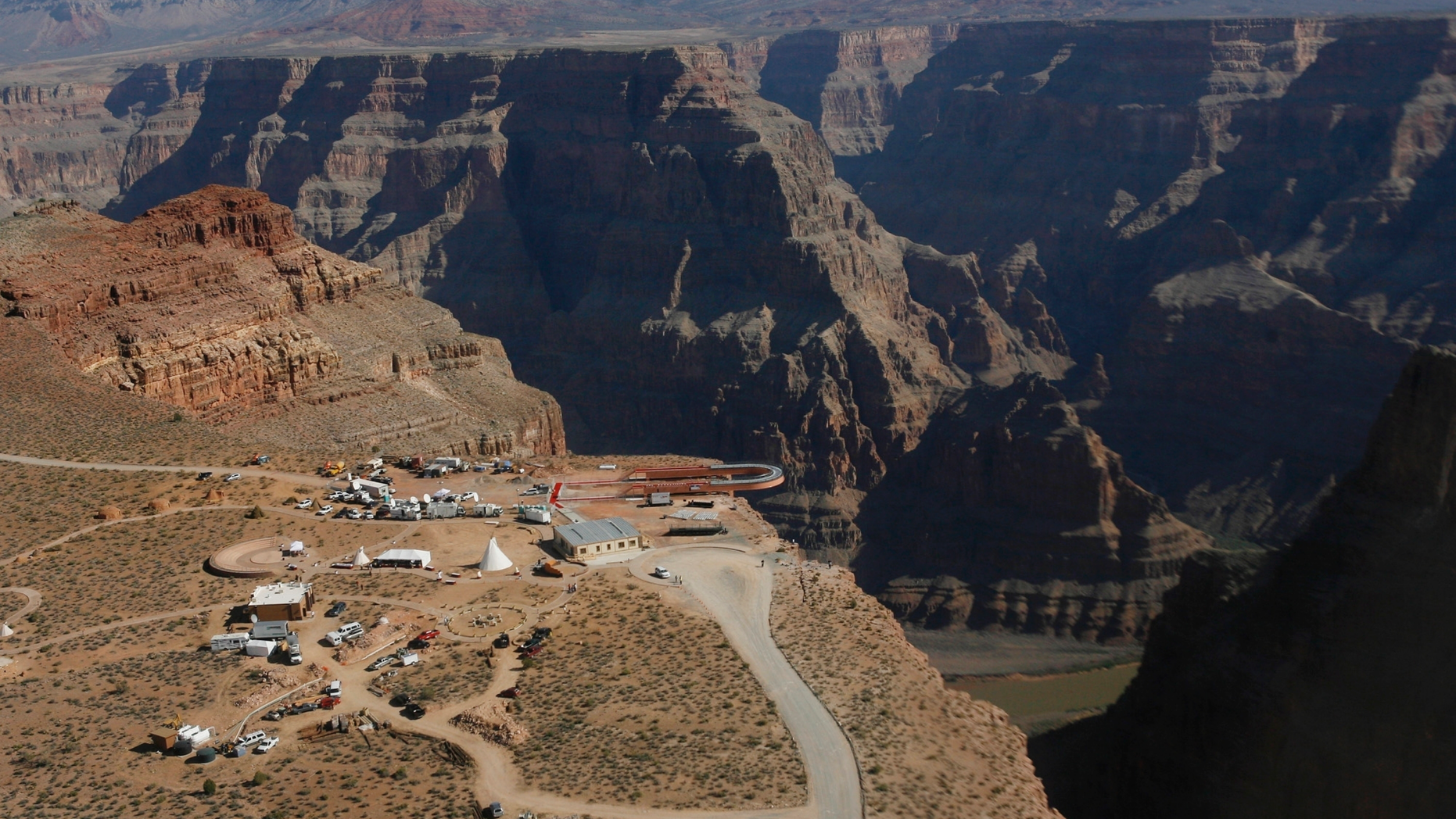 REPORT - In the archival photo of March 20, 2007, the Skywalk is suspended over the Grand Canyon, on the Hualapai Indian Reserve, before the grand opening ceremony at Grand Canyon West, Arizona. track dozens of seemingly accidental fatal falls since the national park was established 100 years ago. (AP Photo / Ross D. Franklin, File)