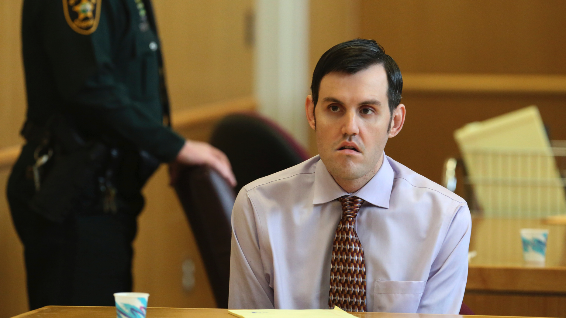 File- In this March 21, 2019 file photo, John Jonchuck appears before Judge Chris Helinger during his trial at the Pinellas County Criminal Justice Center in Clearwater, Fla. A prosecutor says a Florida man who threw his 5-year-old daughter off a Tampa Bay area bridge knew what he was doing was wrong, and that he should be found guilty of first-degree murder. Prosecutor Paul Bolan told jurors in his closing arguments Monday, April 15, 2019, that John Jonchuck clearly knew what he was doing when he dropped his daughter Phoebe 62 feet into Tampa Bay four years ago. (Scott Keeler/Tampa Bay Times via AP, Pool, File)