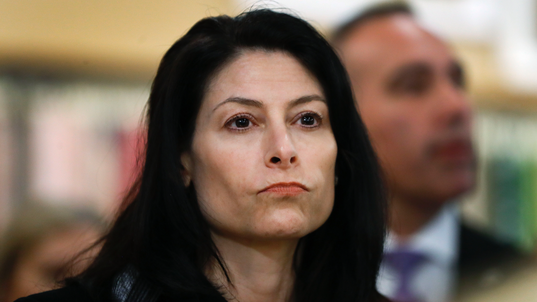 FILE--In this March 18, 2019, file photo, Michigan Attorney General Dana Nessel attends an event for Democratic presidential candidate Sen. Kirsten Gillibrand, D-N.Y., in Clawson, Mich. A major faith-based foster care and adoption contractor for the state of Michigan is reversing its policy and will place children with same-sex couples to comply with a legal settlement. Nessel, a Democrat, announced the settlement last month with same-sex couples who had sued. It prevents faith-based agencies from refusing to put children in LGBT households for religious reasons if it has accepted them for referral from the Michigan Department of Health and Human Services. (AP Photo/Paul Sancya File)