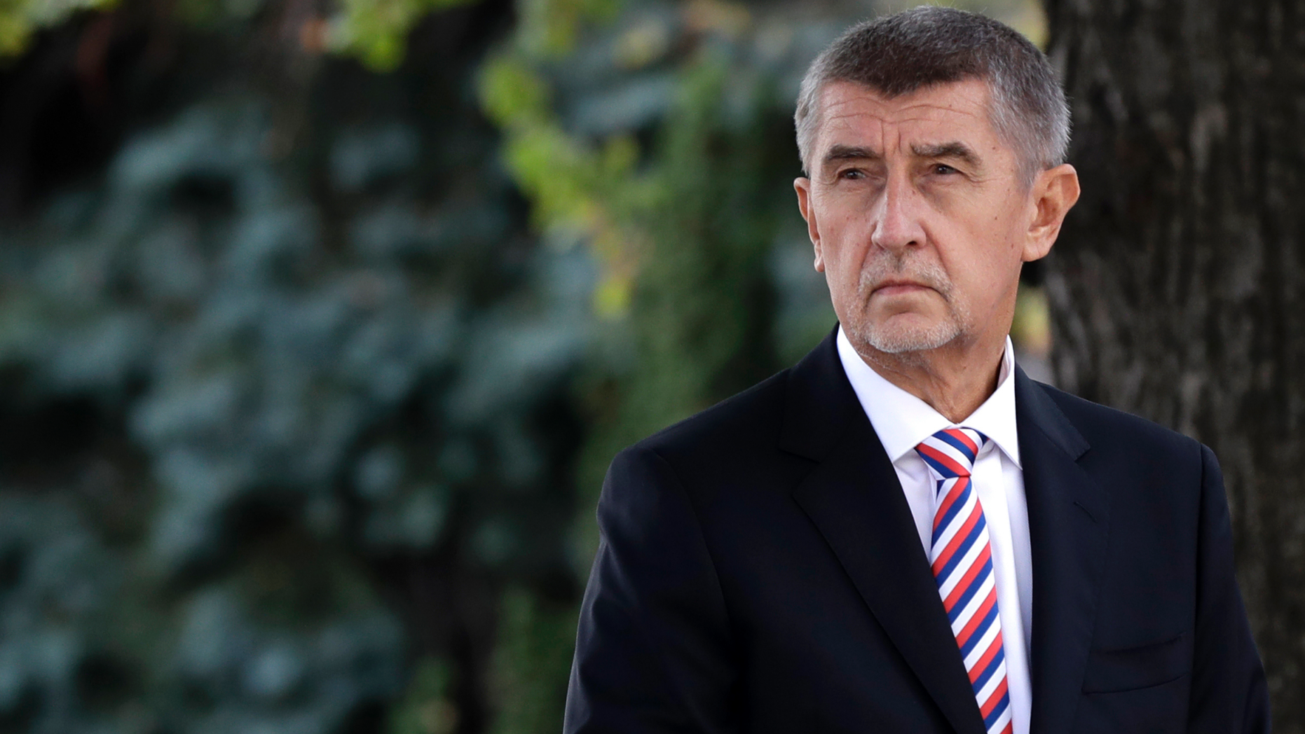 FILE - In this Oct. 26, 2018 file photo Czech Republic's Prime Minister Andrej Babis waits in front of his residency in Prague, Czech Republic. Czech police have completed their investigation of Prime Minister Andrej Babis over alleged fraud involving European Union subsidies and proposed he faces trial. The Prague municipal prosecution said Wednesday, April 17, 2019 it has received the results’ of the investigation into Babis' possible involvement in the $2 million fraud. (AP Photo/Petr David Josek, file)