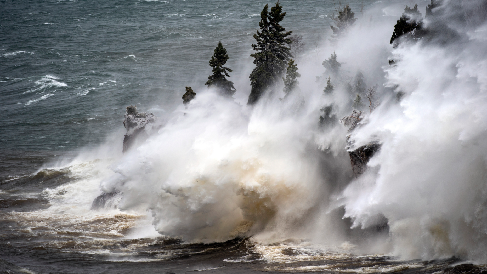 Waves pound the shoreline at Tettegouche State Park Thursday, April 11, 2019 at Silver Bay, Minn. Wind gusts were up to 50 milers per hour. (Brian Peterson/Star Tribune via AP)