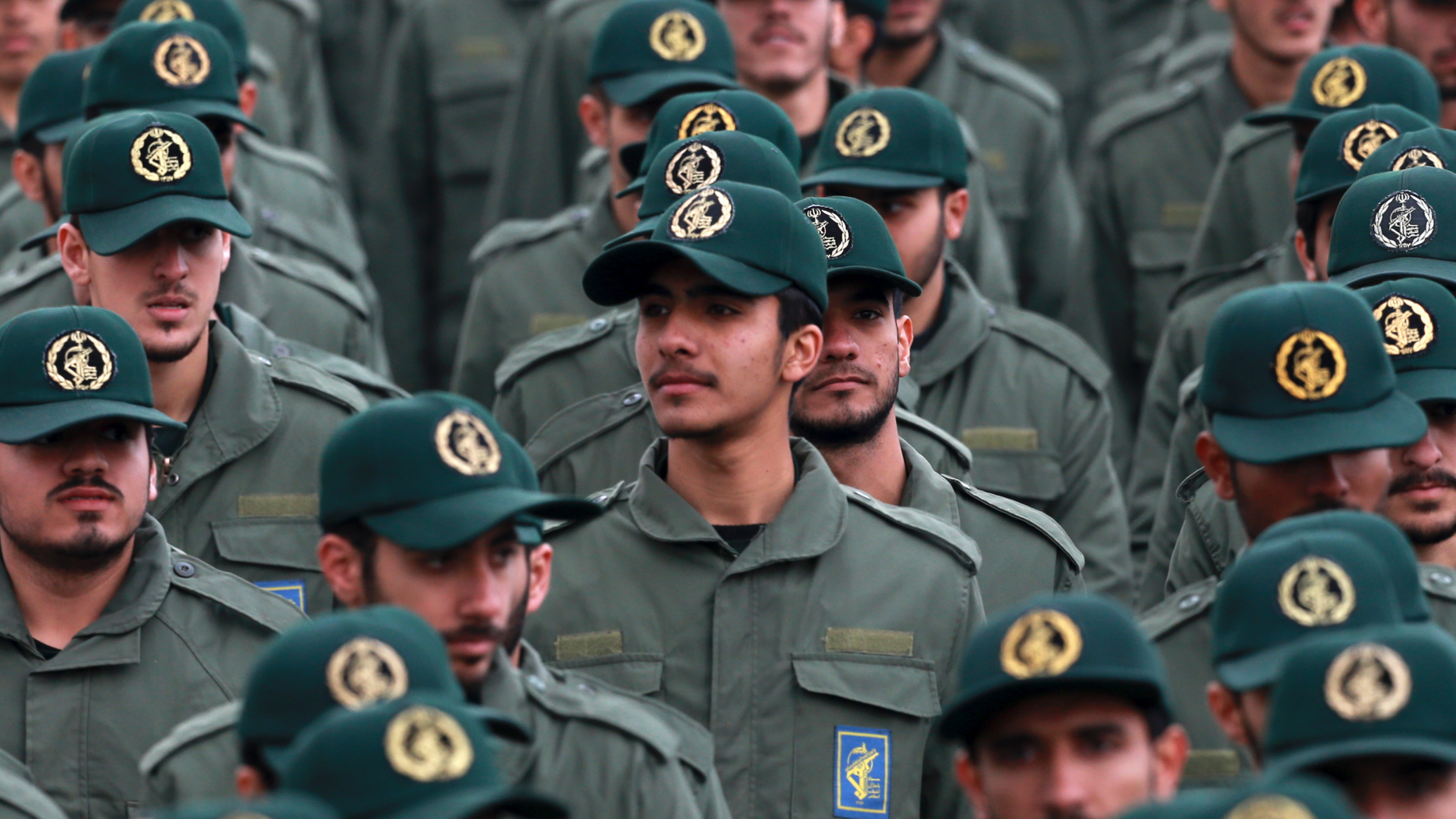 FILE - In this Feb. 11, 2019 file photo, Iranian Revolutionary Guard members attend a ceremony celebrating the 40th anniversary of the Islamic Revolution, at the Azadi, or Freedom, Square in Tehran, Iran. The Trump administration on Wednesday granted important exemptions to new sanctions on Iran’s Revolutionary Guard, watering down the effects of the measures while also eliminating an aspect that would have complicated U.S. foreign policy efforts. (AP Photo/Vahid Salemi)
