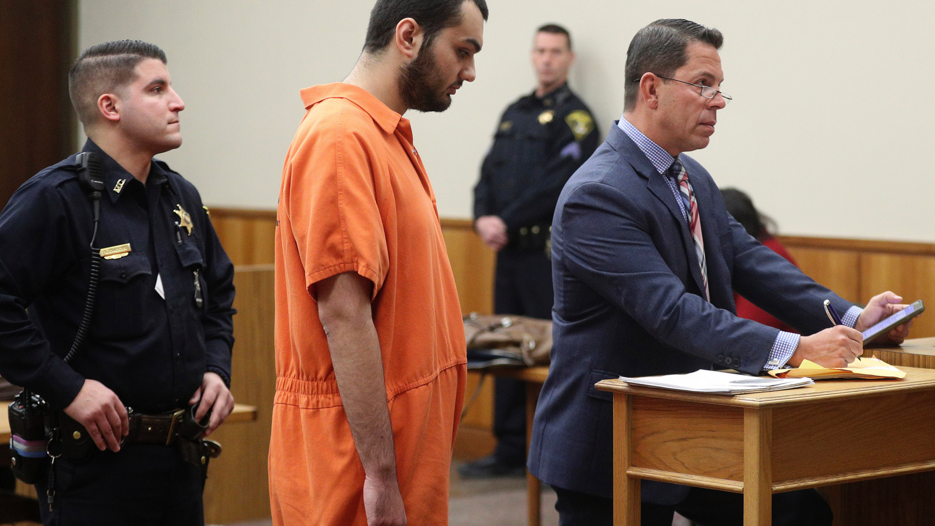 Vincent Vetromile appears in court with his attorney Stephen Sercu in Rochester, N.Y., on Thursday, March 7, 2019. Vetromile and three others are charged with plotting to attack an Islamic community in upstate New York. (Jamie Germano/Democrat & Chronicle via AP, Pool)