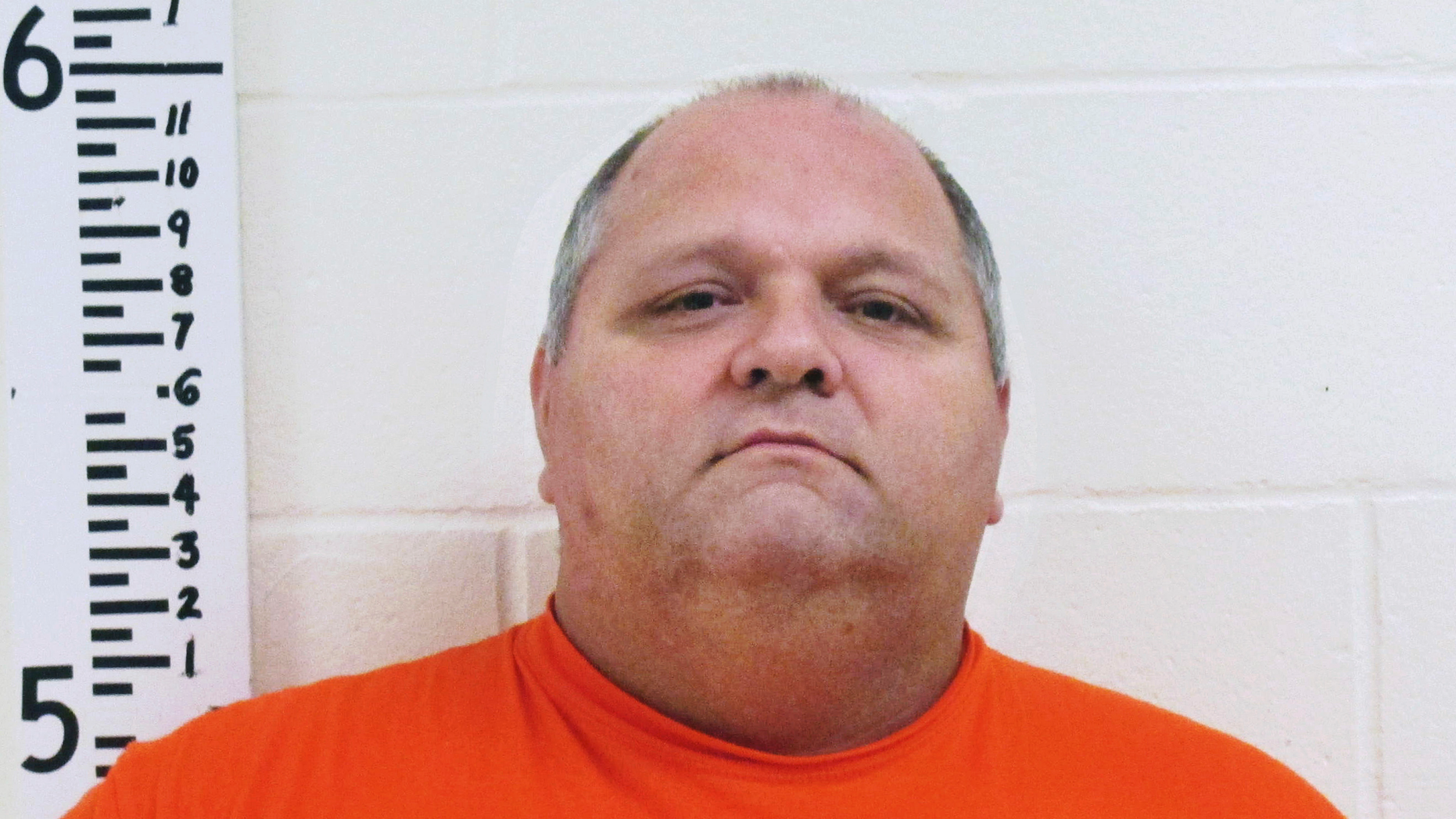 This undated booking photo published by the York County Sheriff's Department shows Michael Middleton, accused of marrying women in several states, including New Hampshire. Middleton, accused of being married to several women, pleaded guilty on Monday, April 29, 2019 to bigamy in New Hampshire, but will avoid the penalty of imprisonment if he behaves for the next five years. . (York County Sheriff's Department via AP)