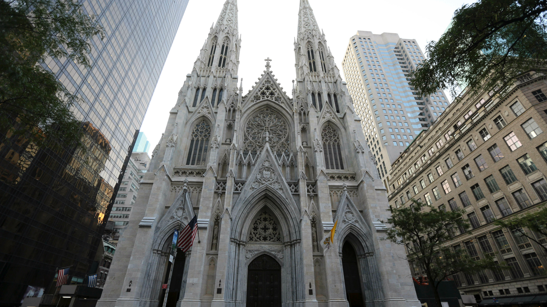 This Sunday, Aug. 30, 2015 file photo shows the newly renovated and cleaned facade of St. Patrick's Cathedral in New York. The Archdiocese of New York says at least 120 priests accused of sexually abusing a child or having child pornography have worked there over decades. The nation’s second-largest archdiocese released a list of names on Friday, April 26, 2019. (AP Photo/Mary Altaffer, File)