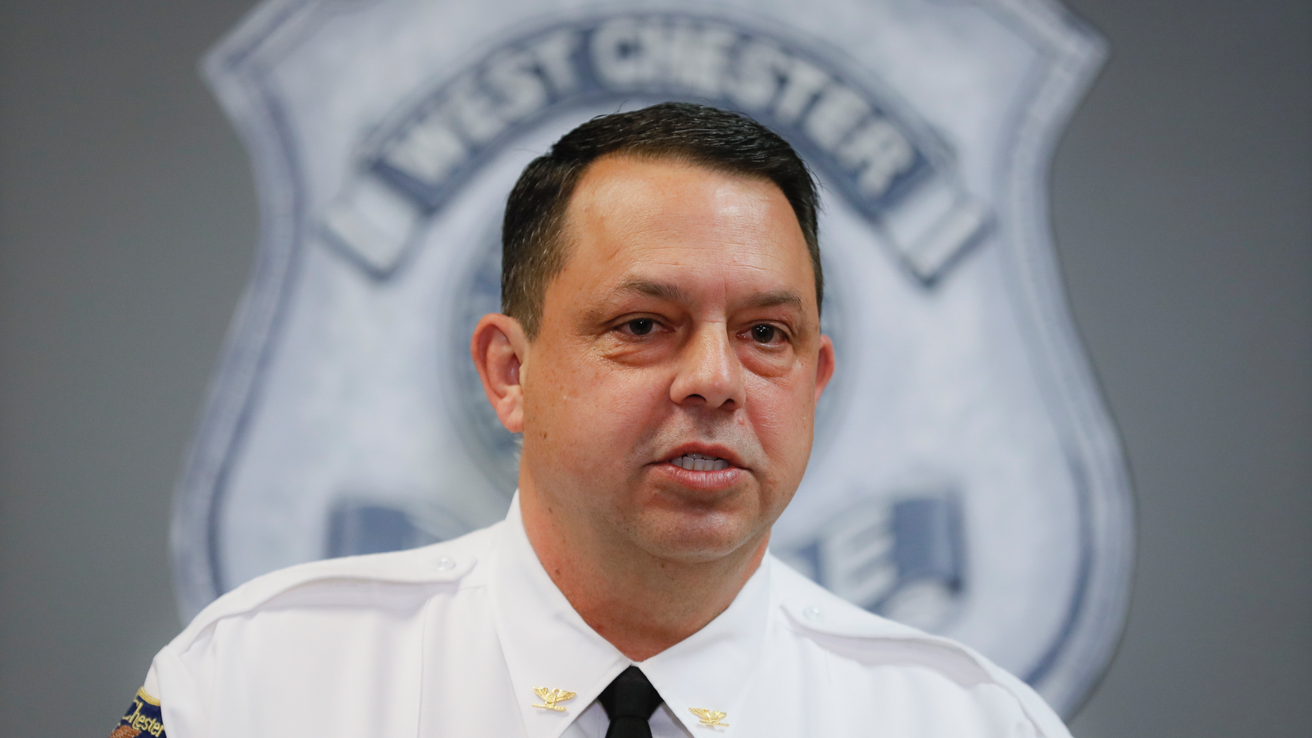 West Chester Chief of Police Joel Herzog speaks to reporters during a news conference, Monday, April 29, 2019, in West Chester, Ohio. Multiple people were found dead at an apartment complex in Ohio after a man called 911 saying he had returned home to find his wife and family members on the ground and bleeding. Herzog said that police were searching the area for any suspect, and there was no immediate threat to the community. (AP Photo/John Minchillo)
