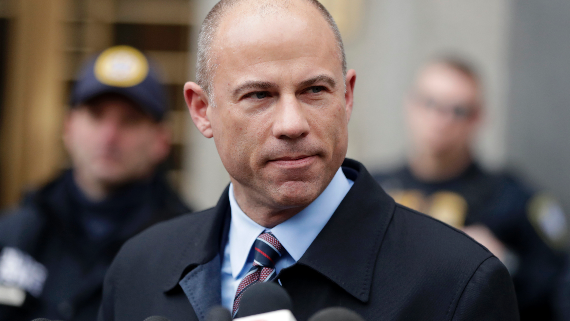 FILE - In this Dec. 12, 2018, file photo, attorney Michael Avenatti, speaks outside court in New York.An indictment filed against Avenatti, Wednesday, April 10, alleges he stole millions of dollars from clients, didn’t pay his taxes, committed bank fraud and lied in bankruptcy proceedings. (AP Photo/Julio Cortez, File)