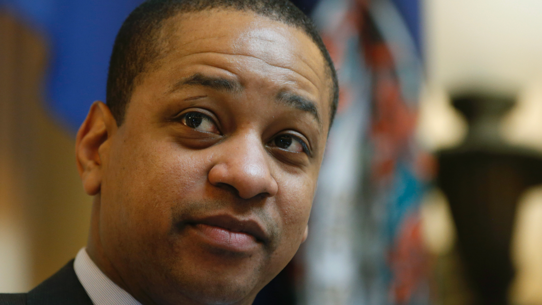 FILE - In this Feb. 22, 2019 file photo, Virginia Lt. Gov. Justin Fairfax presides over the Senate session at the Capitol in Richmond, Va. One of the two women accusing Fairfax of sexual assault says his response has been "disgraceful, irresponsible and manipulative." In an interview aired Monday, April 1 with CBS News, Vanessa Tyson criticized Fairfax for comparing himself to lynching victims when he defended himself in a speech on the state Senate floor in February. (AP Photo/Steve Helber, File)