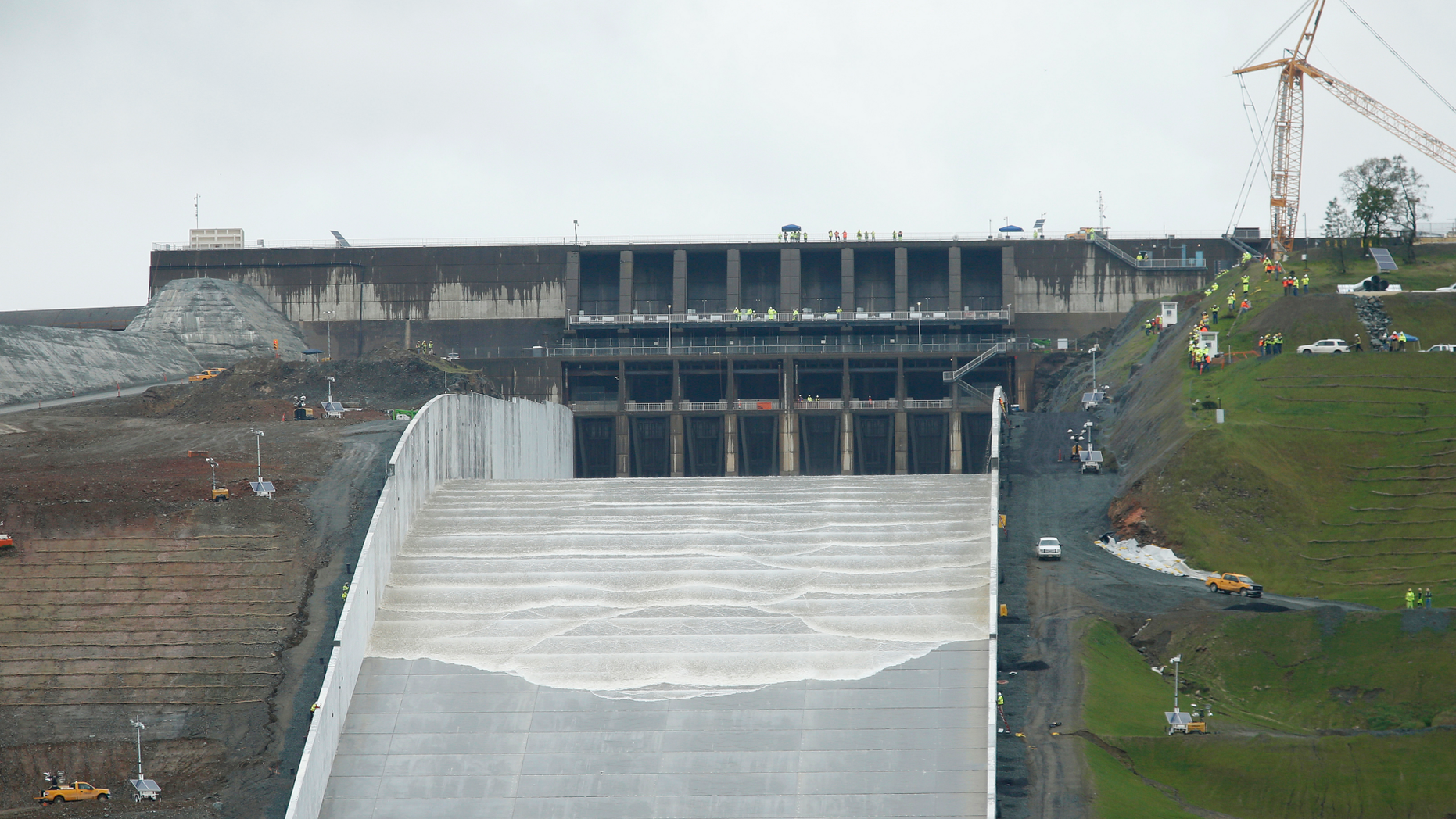 Water flows down the Oroville Dam spillway in Oroville, Calif., Tuesday, April 2, 2019. California officials opened the flood-control spillway at the nation's tallest dam for the first time since it was rebuilt after it crumbled during heavy rains two years ago.(AP Photo/Rich Pedroncelli)