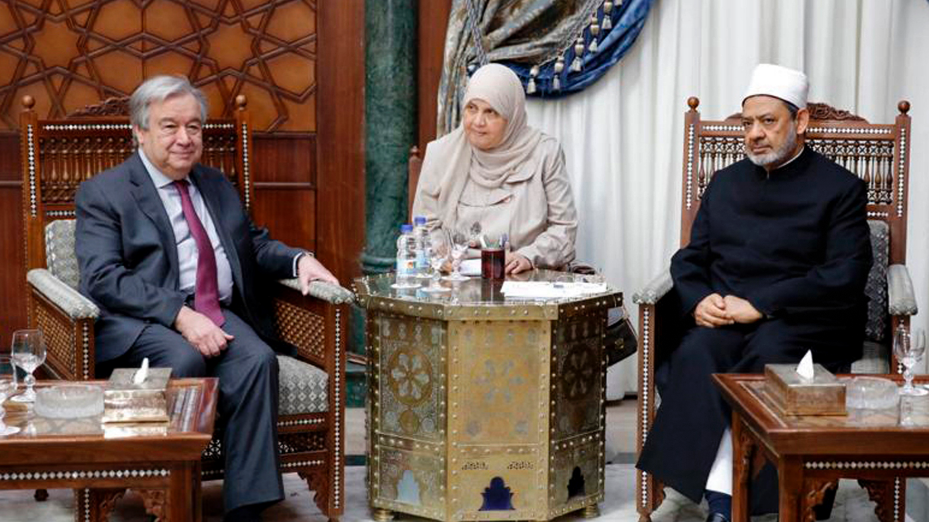 This photo released by Al Azhar, shows U.N. Secretary-General Antonio Guterres, left, during a meeting with Muslim cleric Sheikh Ahmed el-Tayeb, the grand imam, at the Al Azhar headquarters in Cairo, Egypt, Tuesday April 2, 2019. The U.N. chief has expressed solidarity with Muslims the world over during a visit to Cairo, denouncing hate speech and racism, as well as anti-Semitism. (Al Azhar via AP)