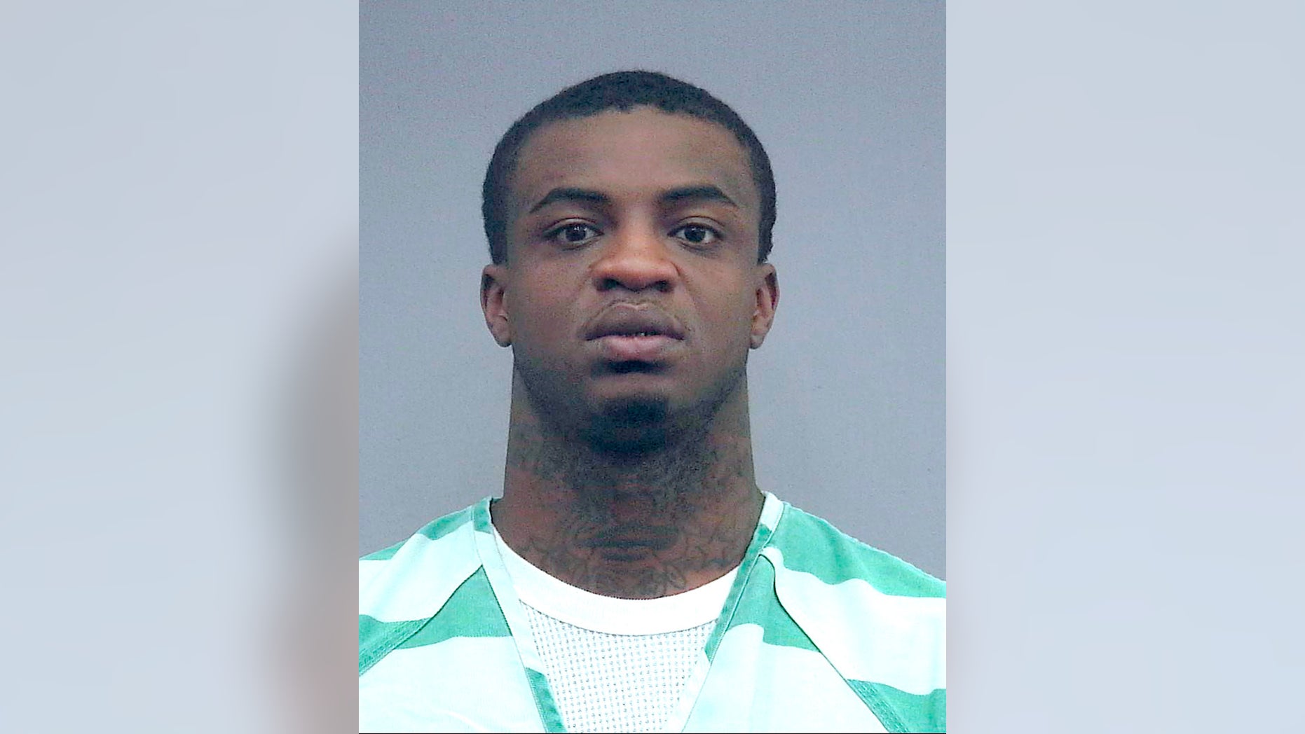 In this April 10, 2019 photo made available by the Alachua County Sheriff's Office shows Christopher McCallum under arrest. McCallum, a Florida rapper, was arrested after threatening a mass shooting after song lyrics posted on Facebook say he will "catch you at a Gator game and shoot the whole campus up." (Alachua County Sherriff's Office via AP)