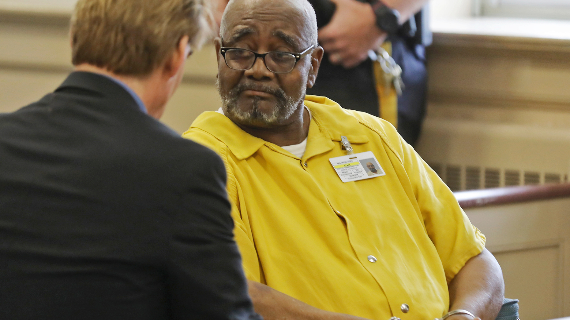 FILE - In this May 30, 2018, file photo, attorney Matthew Reisig speaks with his client Hudy Muldrow before the start of the detention hearing in Morristown, N.J. Muldrow has pleaded not guilty in a May 2018 crash that killed a student and teacher in New Jersey. (Chris Pedota/The Record via Internet, Pool, File)
