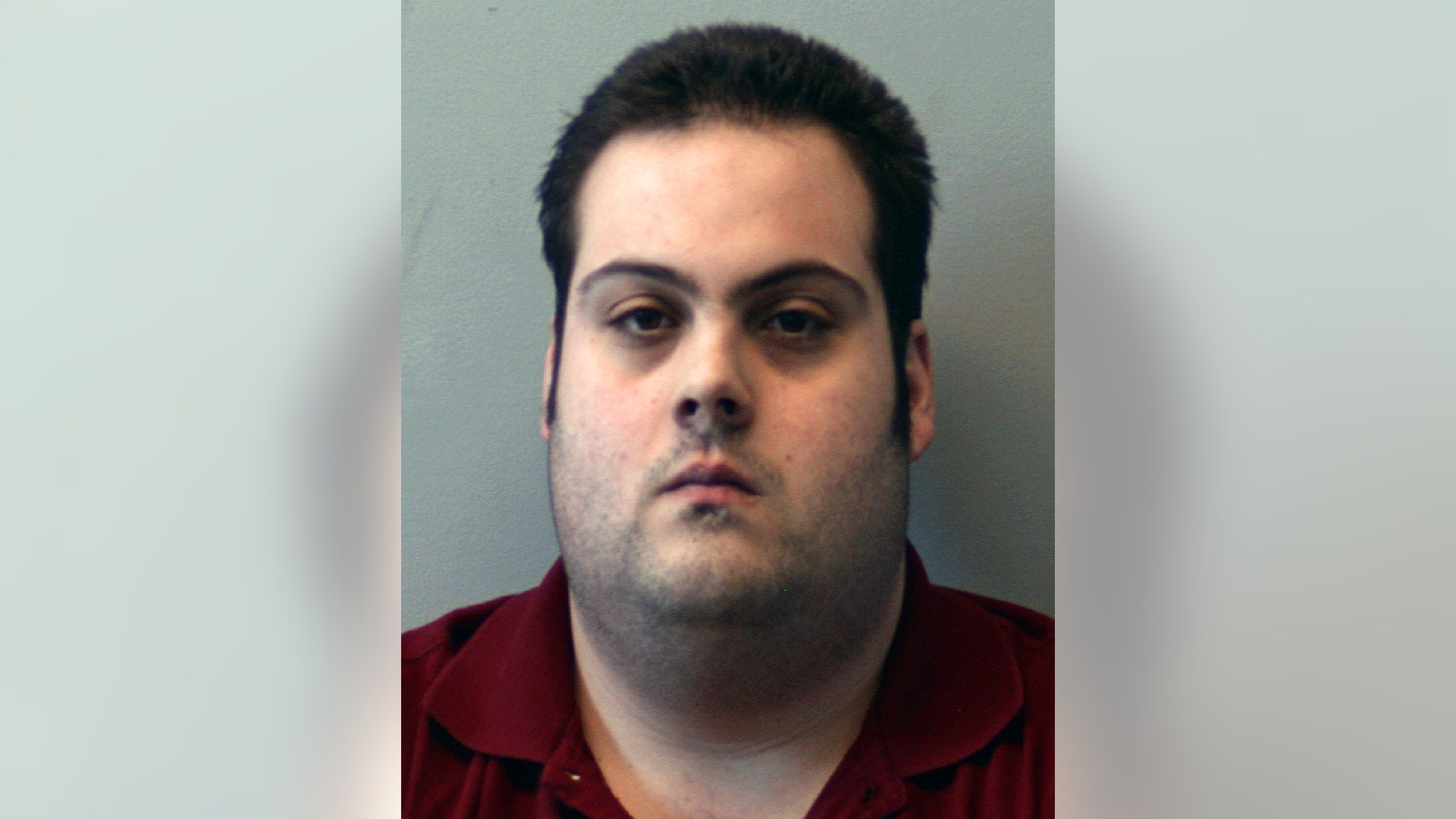 FILE - This booking photo released Thursday, March 1, 2018, by the Beverly Police Department shows Daniel Frisiello, of Beverly, Mass., accused of mailing five envelopes containing a white powder. Prosecutors are seeking three years in prison for Frisiello who admitted to sending threatening letters filled with white powder to President Donald Trump’s sons and others. Frisiello is set to be sentenced Friday, April 19, 2019, in Boston federal court. (Beverly Police Department via AP, File)