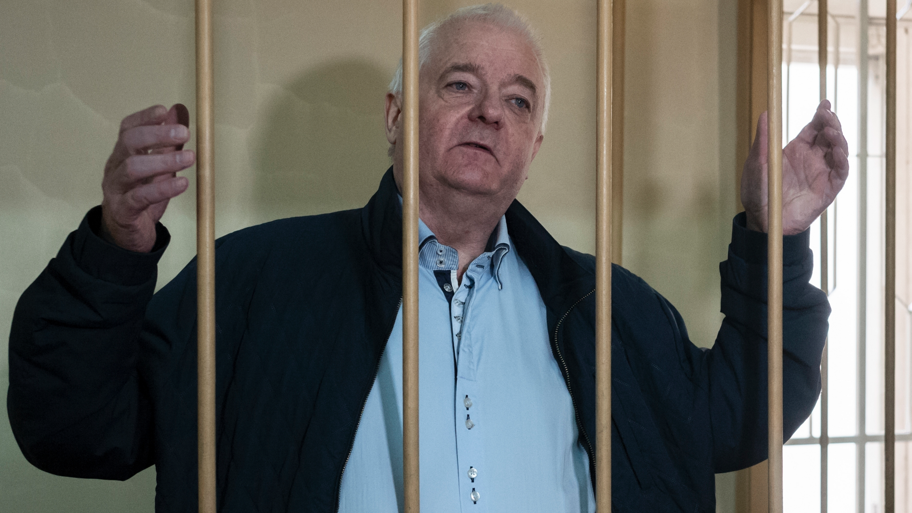 FILE - In this Monday, Oct. 1, 2018 file photo, Norwegian national Frode Berg, who is accused of spying on Russia, stands in a cage in Lefortovo district court in Moscow, Russia. Berg has been in custody since his arrest in December 2017 in Moscow. A Russian prosecutor claims that the Norwegian man jailed on espionage charges was seeking classified information about Russian nuclear submarines. (AP Photo/Alexander Zemlianichenko, File)