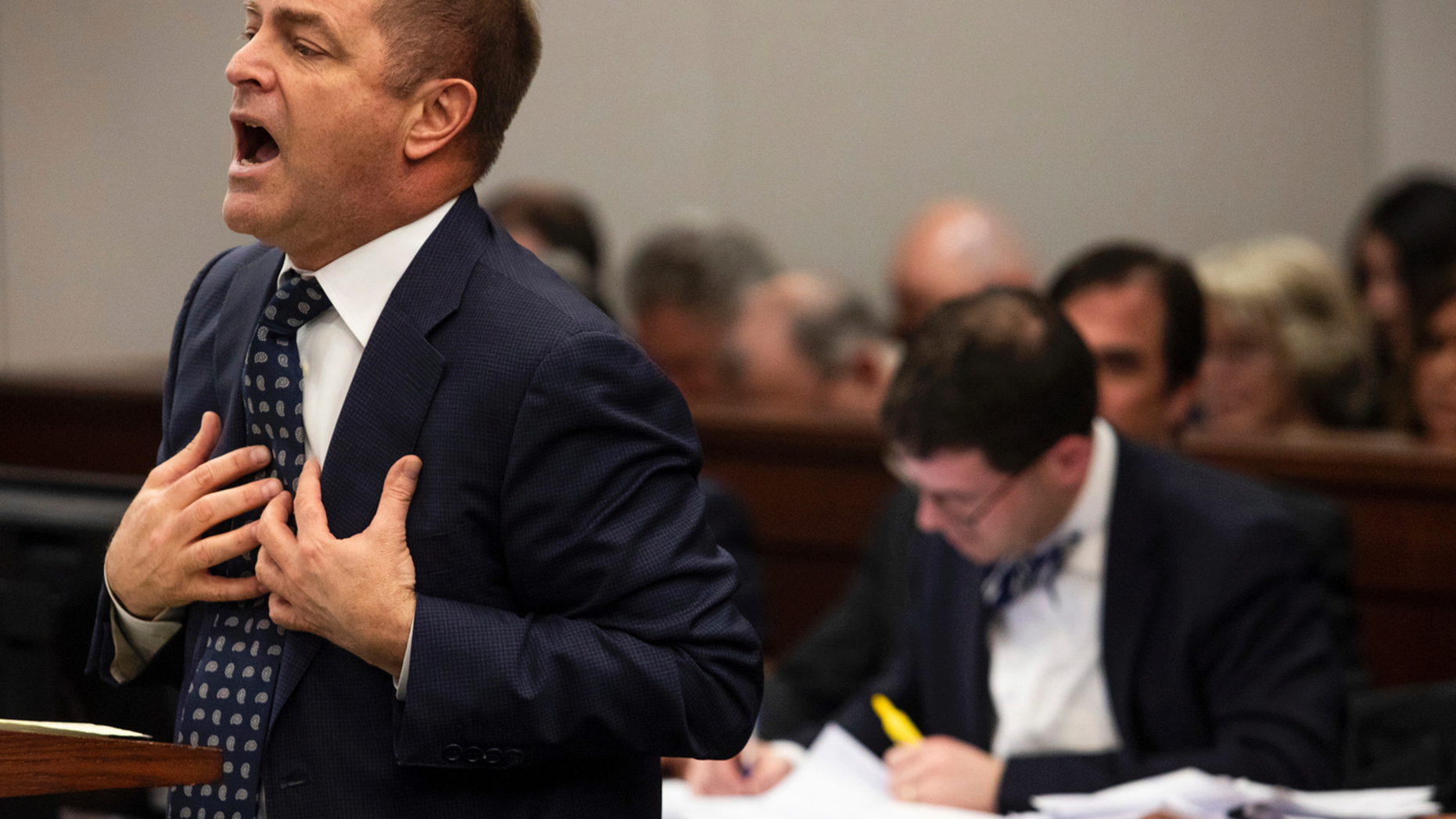 FILE - In this Feb. 6, 2019 file photo, Special prosecutor Todd Flood, left, speaks during a motion hearing at Genesee County Circuit Court in Flint, Mich. Flood, a special prosecutor who spent three years leading a criminal investigation of the Flint water scandal has been fired, officials announced Monday, April 29, 2019, apparently part of the fallout from the recent discovery of 23 boxes of records in the basement of a state building.(Kaiti Sullivan/The Flint Journal via AP File)