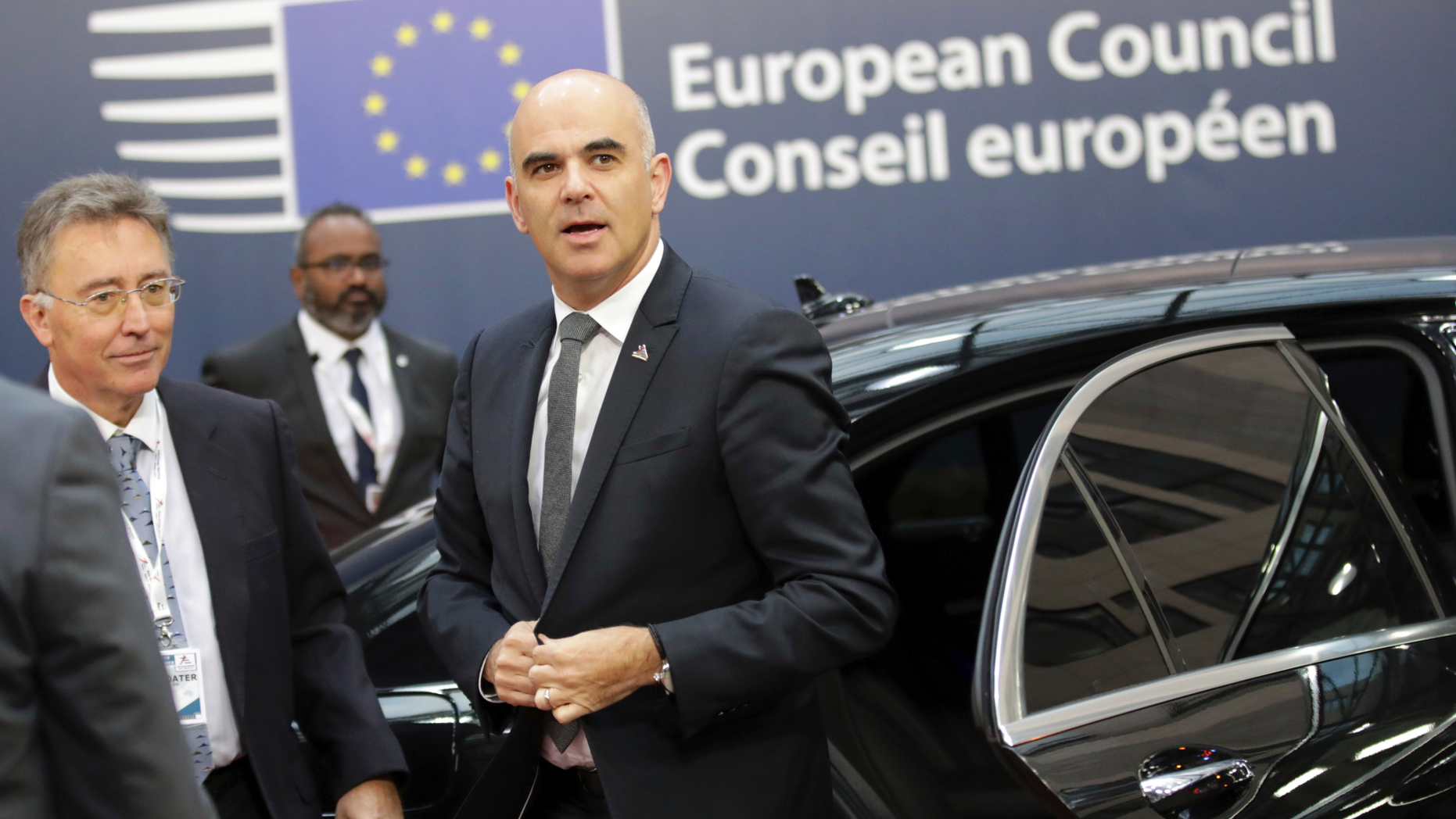 FILE - In this Friday, Oct. 19, 2018 file photo, Switzerland's President Alain Berset arrives for an EU-ASEM summit in Brussels. Britons wondering what life may be like outside the European Union might consider how the Swiss, Turks or Norwegians have fared: They know well the benefits and headaches of being close to - but not part of - the gargantuan economic and political bloc. (AP Photo/Olivier Matthys, file)