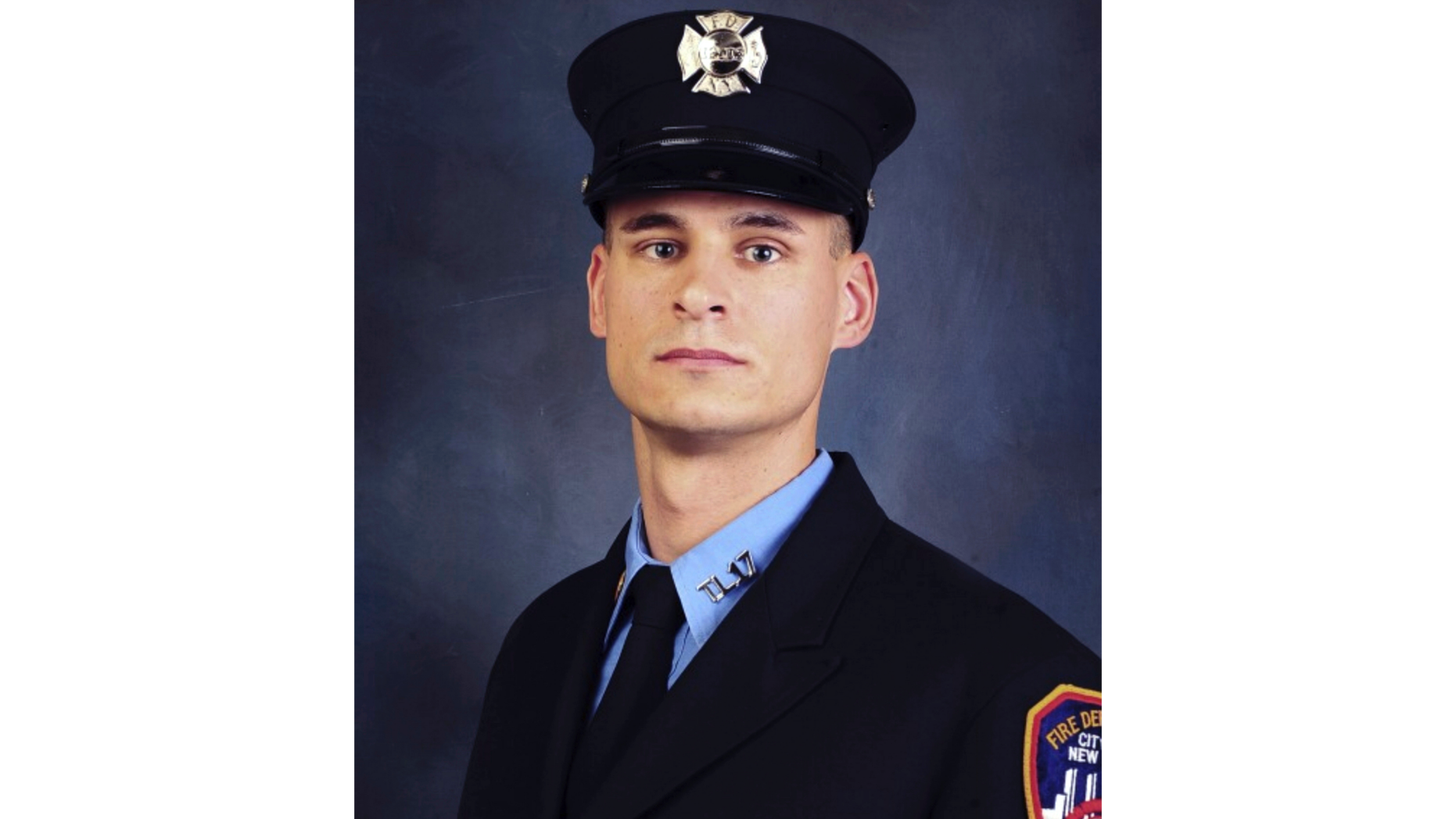 FILE - This undated, file photo provided on April 9, 2019, by the Fire Department of New York shows firefighter Christopher Slutman. The 15-year member of the Fire Department was among three American service members killed by a roadside bomb in Afghanistan on Monday, April 8. (Fire Department of New York via AP, File)
