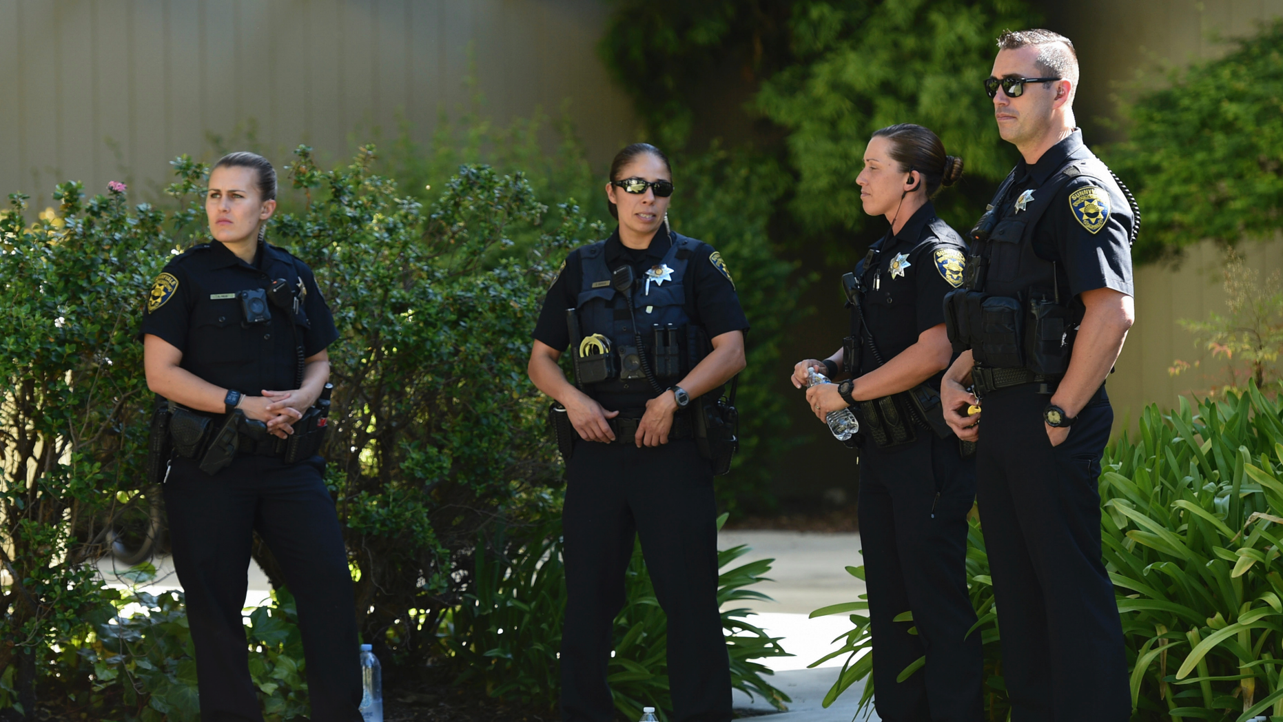 Police stand in front of an apartment complex suspected of being involved in a car accident in Sunnyvale, California on Wednesday, April 24, 2019. Investigators seek to determine the cause of the accident in Northern California, which injured several pedestrians on Tuesday night. Authorities said the driver of the car was arrested after apparently entering the group deliberately. (AP Photo / Cody Glenn)