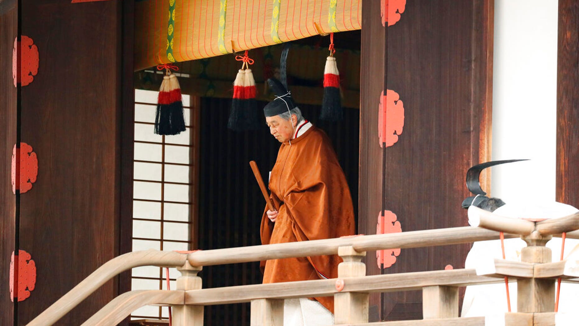 Japan's Emperor Akihito leaves after a ritual to report his abdication to the throne, at the Imperial Palace in Tokyo, Tuesday, April 30, 2019.