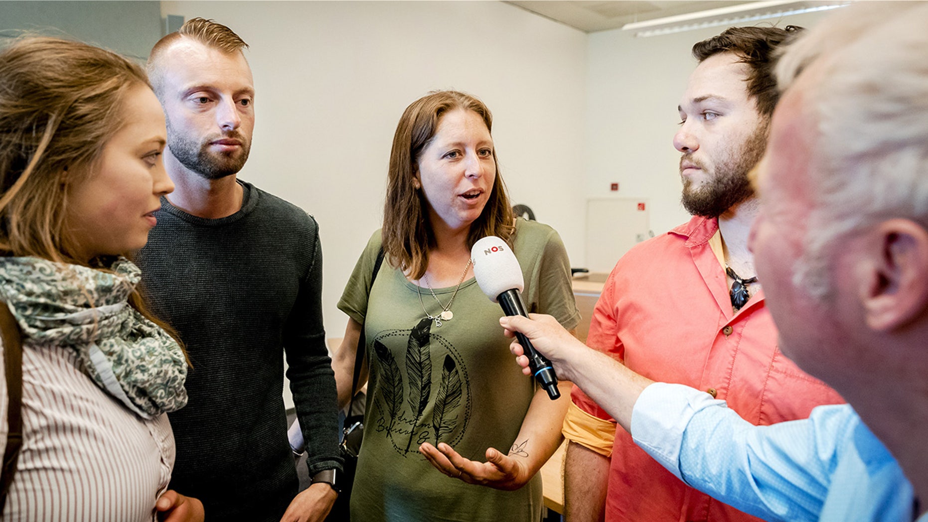 Donor children speak to press as they attend the court decision related to the case of Jan Karbaat, in Rotterdam on June 2, 2017.Â 