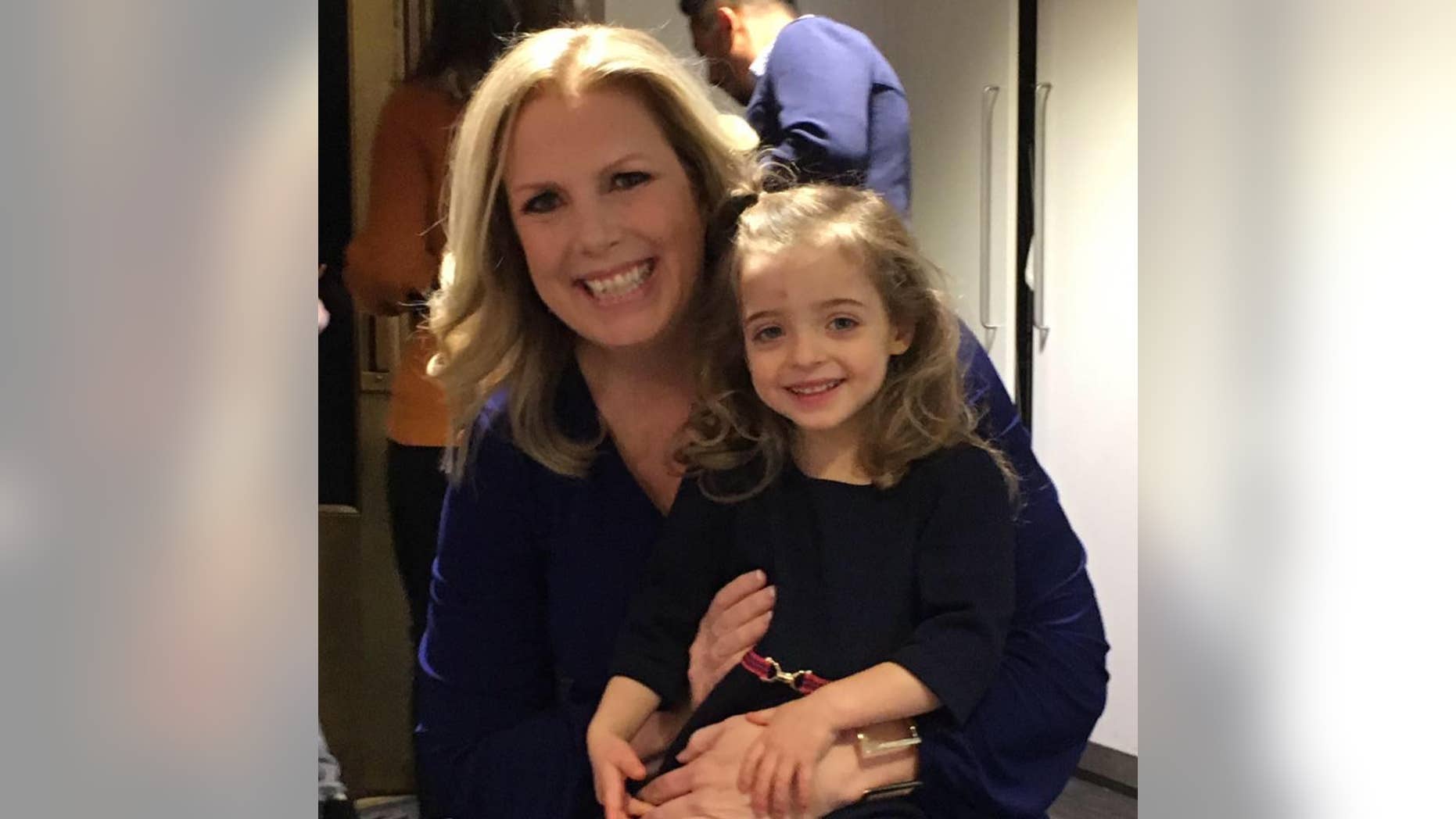 Liz Smith, the picture with daughter Gisele, now 2, first met the girl when she landed in her hospital as an infant.
