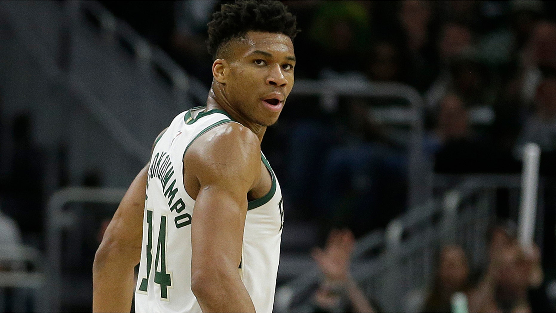 Milwaukee Bucks' Giannis Antetokounmpo reacts after making a shot during the second half of Game 1 of an NBA basketball first-round playoff series against the Detroit Pistons Sunday, April 14, 2019, in Milwaukee. The Bucks won 121-86 (AP Photo/Aaron Gash)