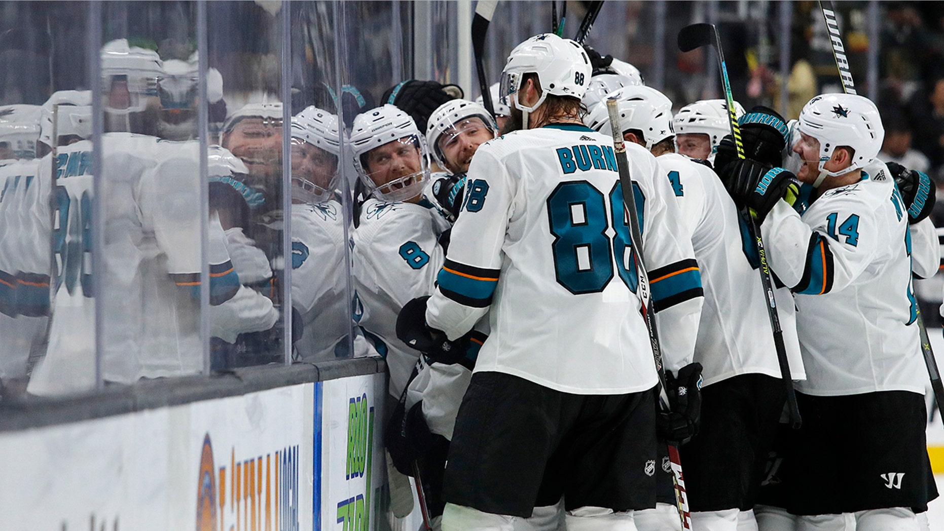 San Jose Sharks celebrate after defeating the Vegas Golden Knights in Game 6 of a first-round NHL hockey playoff series Sunday, April 21, 2019, in Las Vegas. (AP Photo/John Locher)