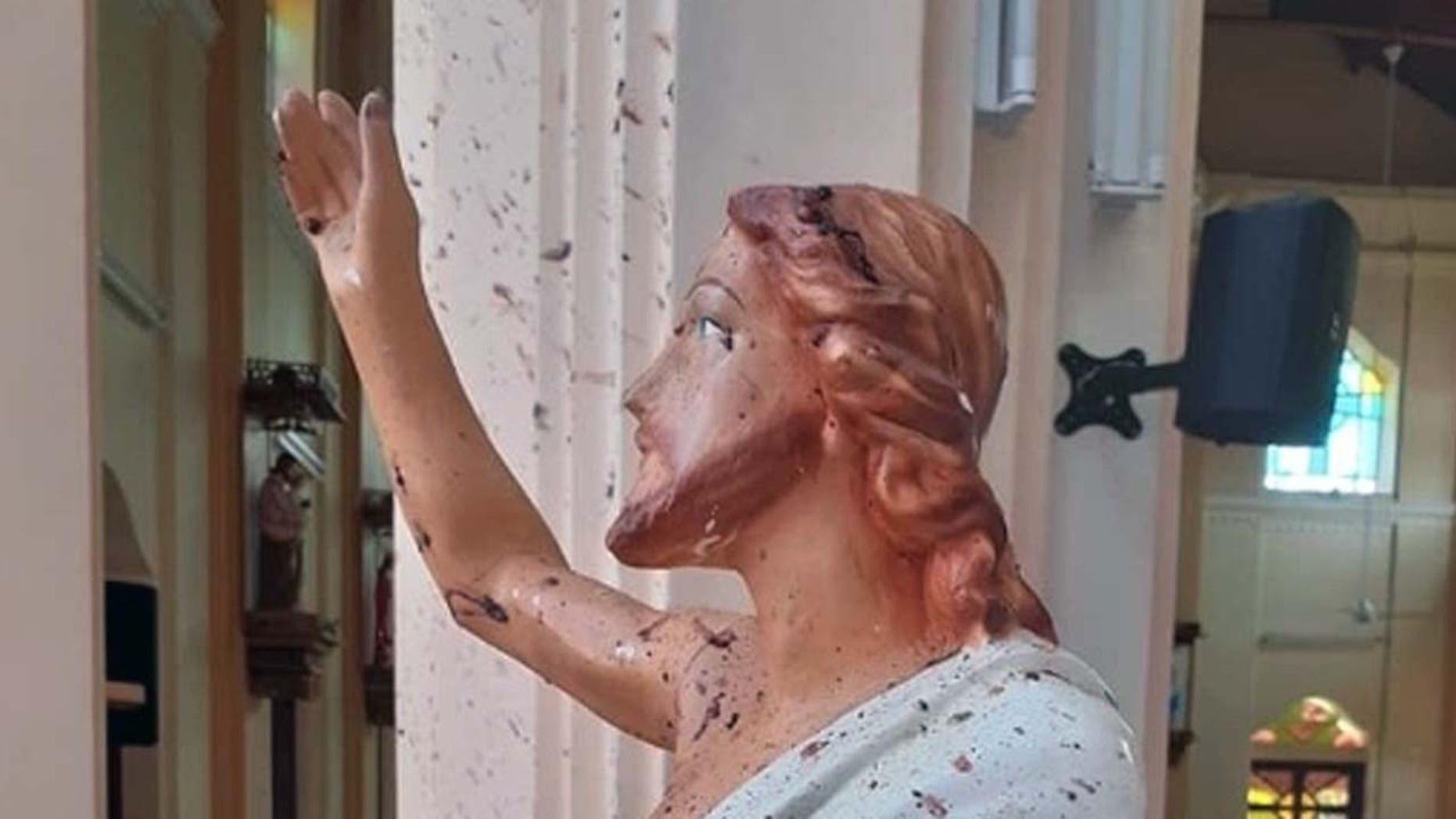 A blood-spattered statue of Jesus from the St. Sebastian church in Sri Lanka, after Islamic militants bombed the church in an Easter Sunday massacre.
