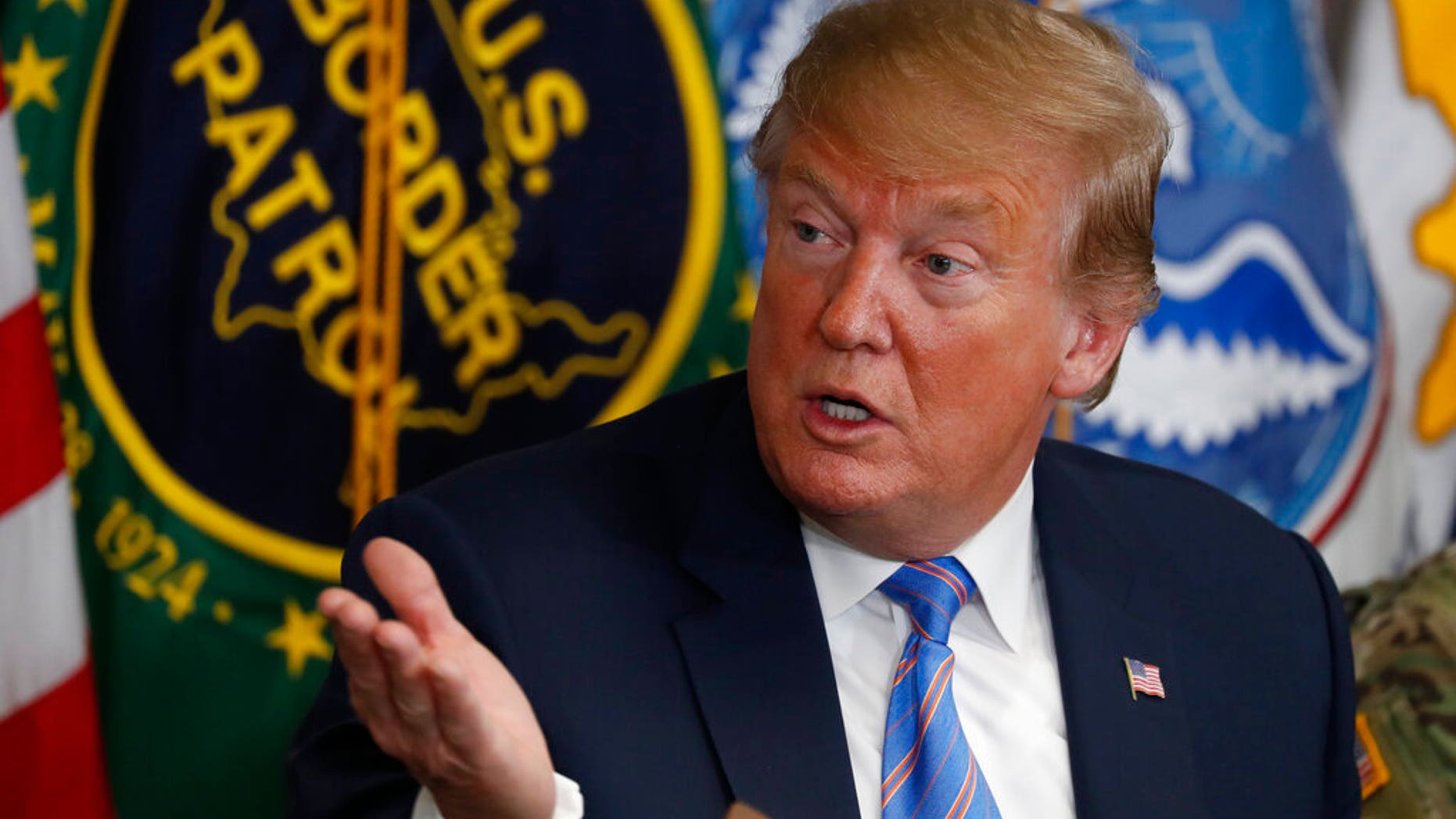 In this April 5, 2019 photo, President Donald Trump participates in a roundtable on immigration and border security at the U.S. Border Patrol Calexico Station in Calexico, Calif. Trump said Friday he is considering sending "Illegal Immigrants" to Democratic strongholds to punish them for inaction— just hours after White House and Homeland Security officials insisted the idea was dead on arrival. (AP Photo/Jacquelyn Martin)