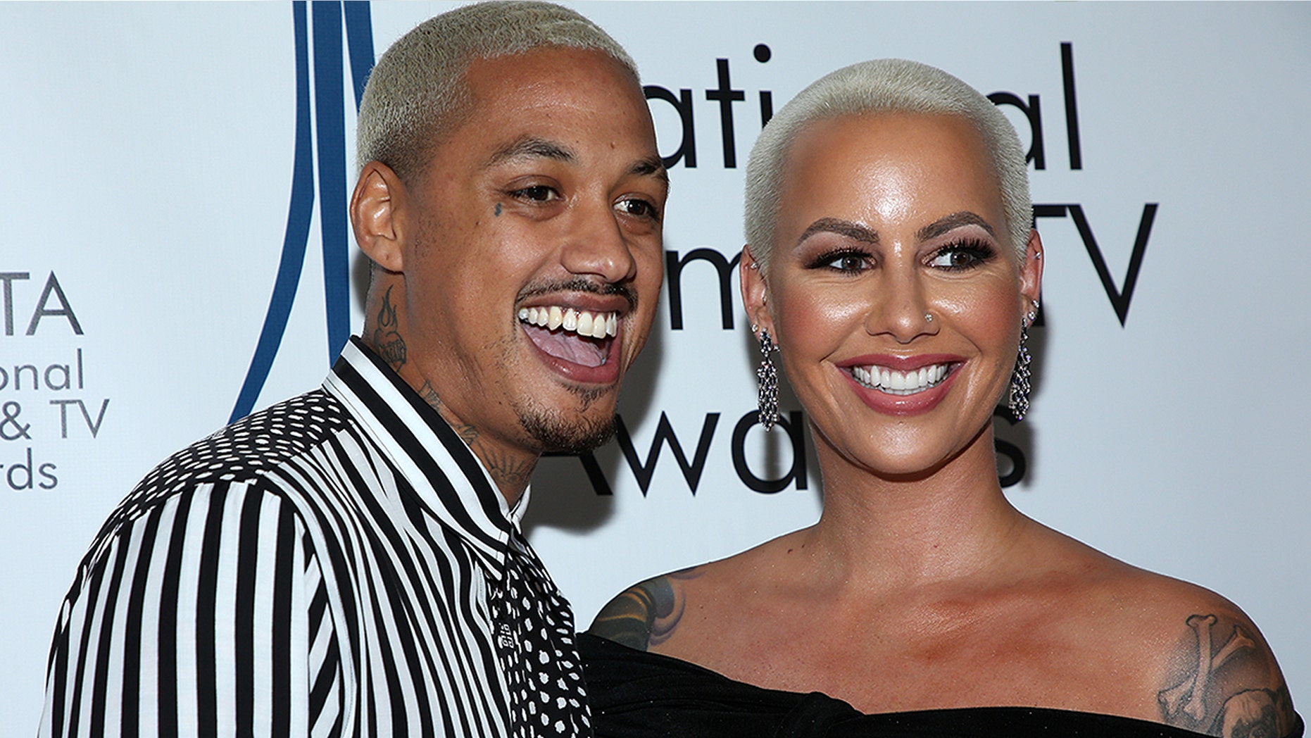 Alexander "AE" Edwards and Amber Rose attend the National Film and Television Awards Ceremony at the Globe Theatre on Dec. 5, 2018 in Los Angeles.